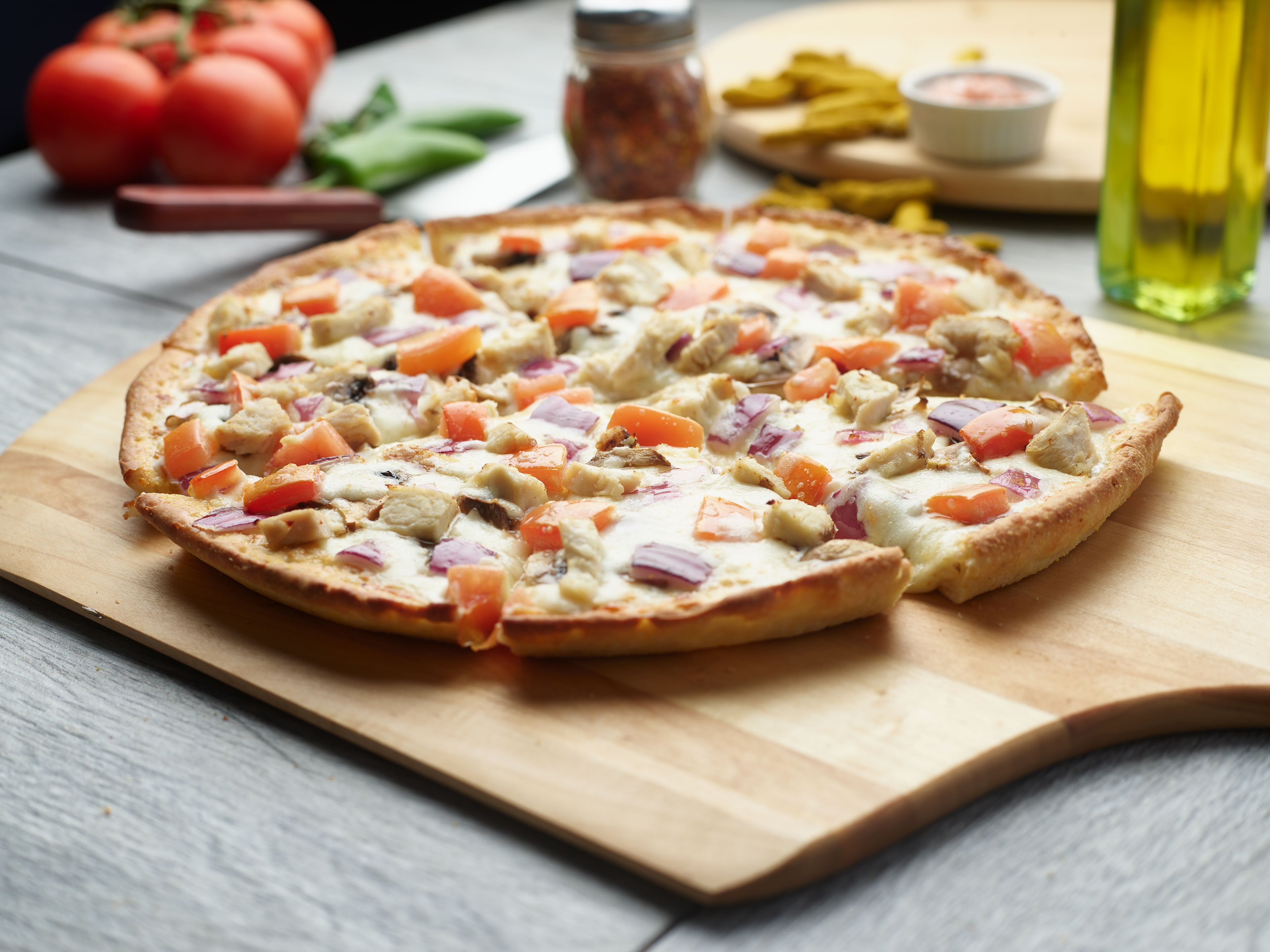 Order Creamy Garlic Chicken Pizzatwist food online from Chicago Pizza With A Twist store, Lynnwood on bringmethat.com