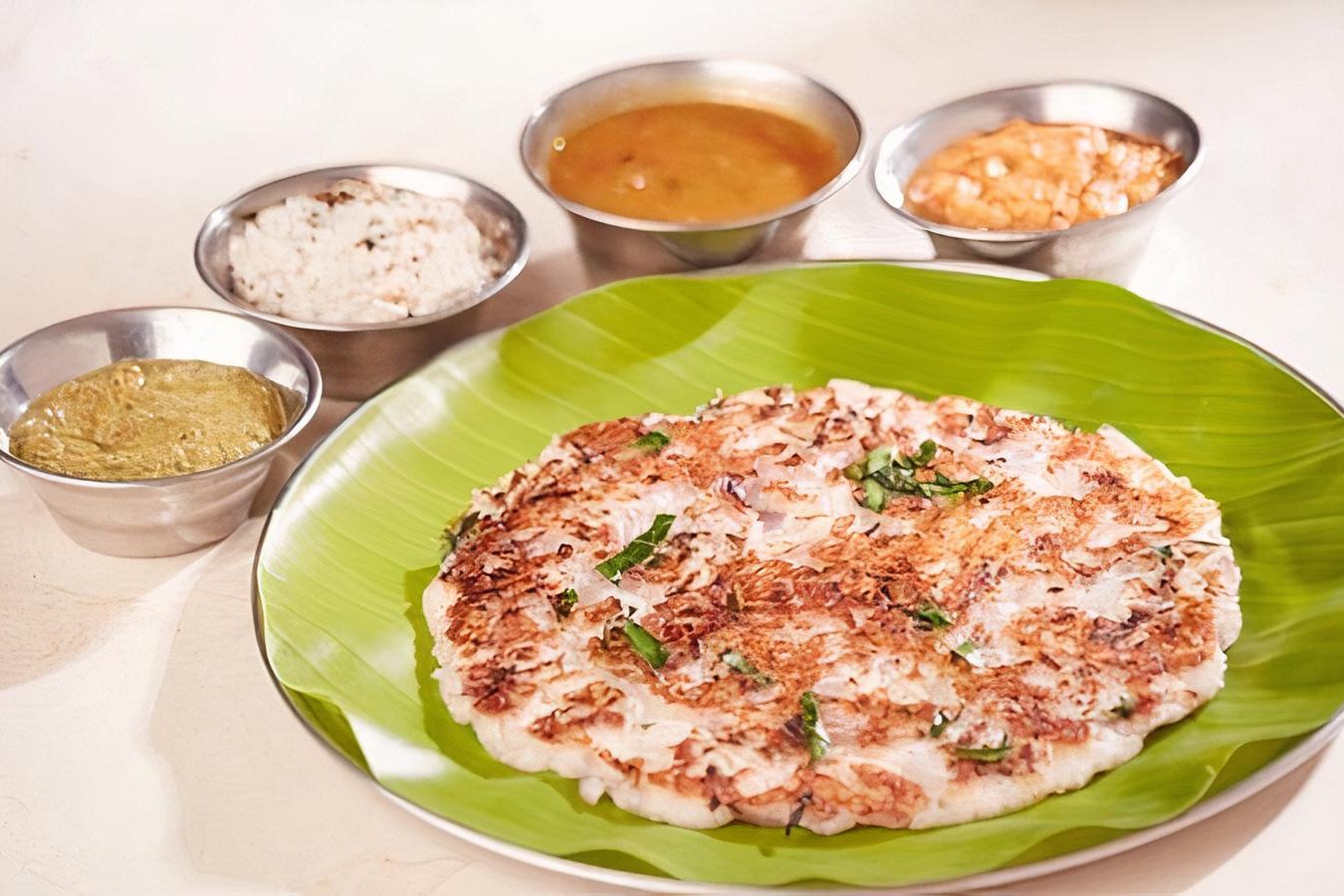 Order Onion Uthappam* food online from Tirupathi Bhimas store, Milpitas on bringmethat.com