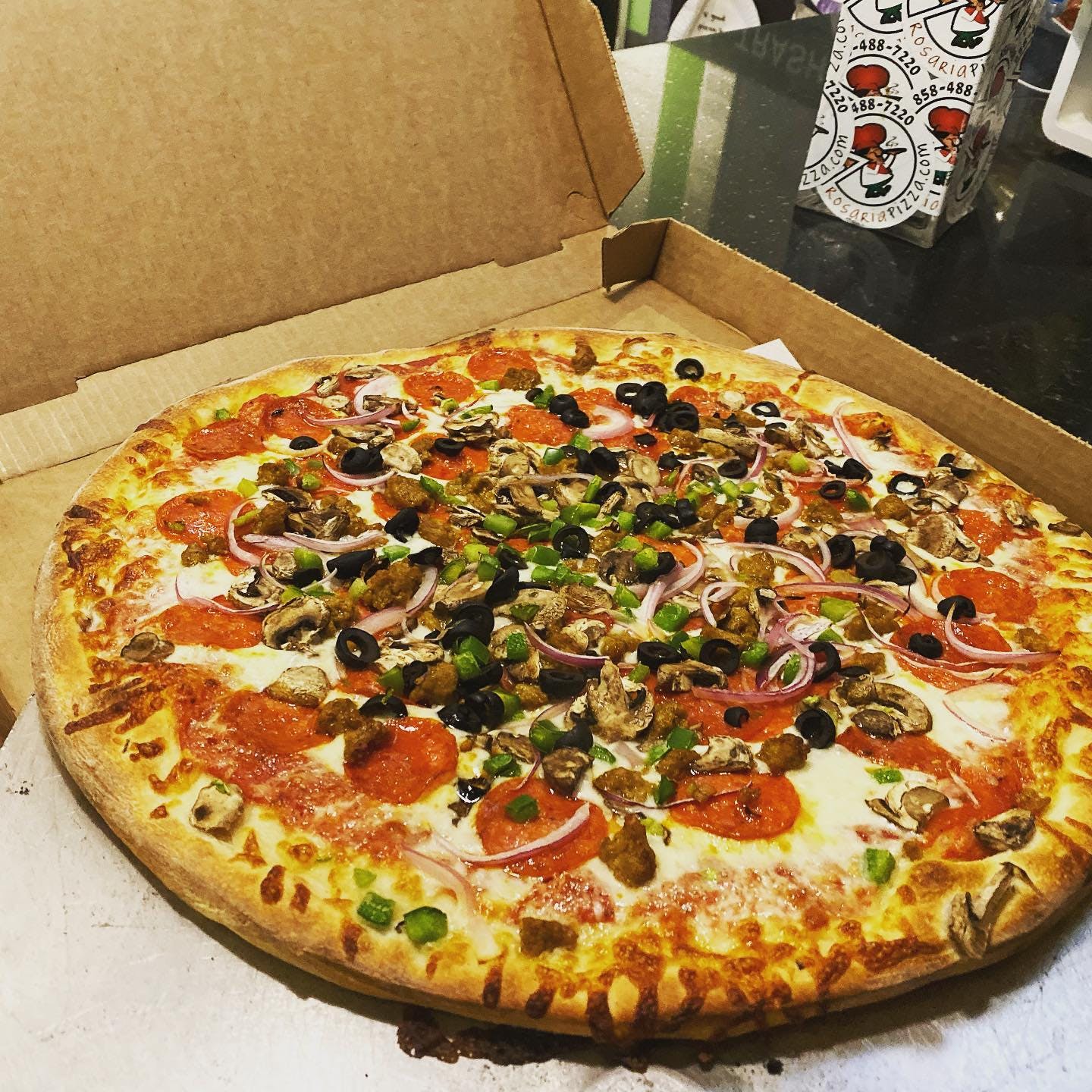 Order Deluxe Pizza - Large 16'' (Serves 5-6) food online from Rosaria Pizza store, Poway on bringmethat.com
