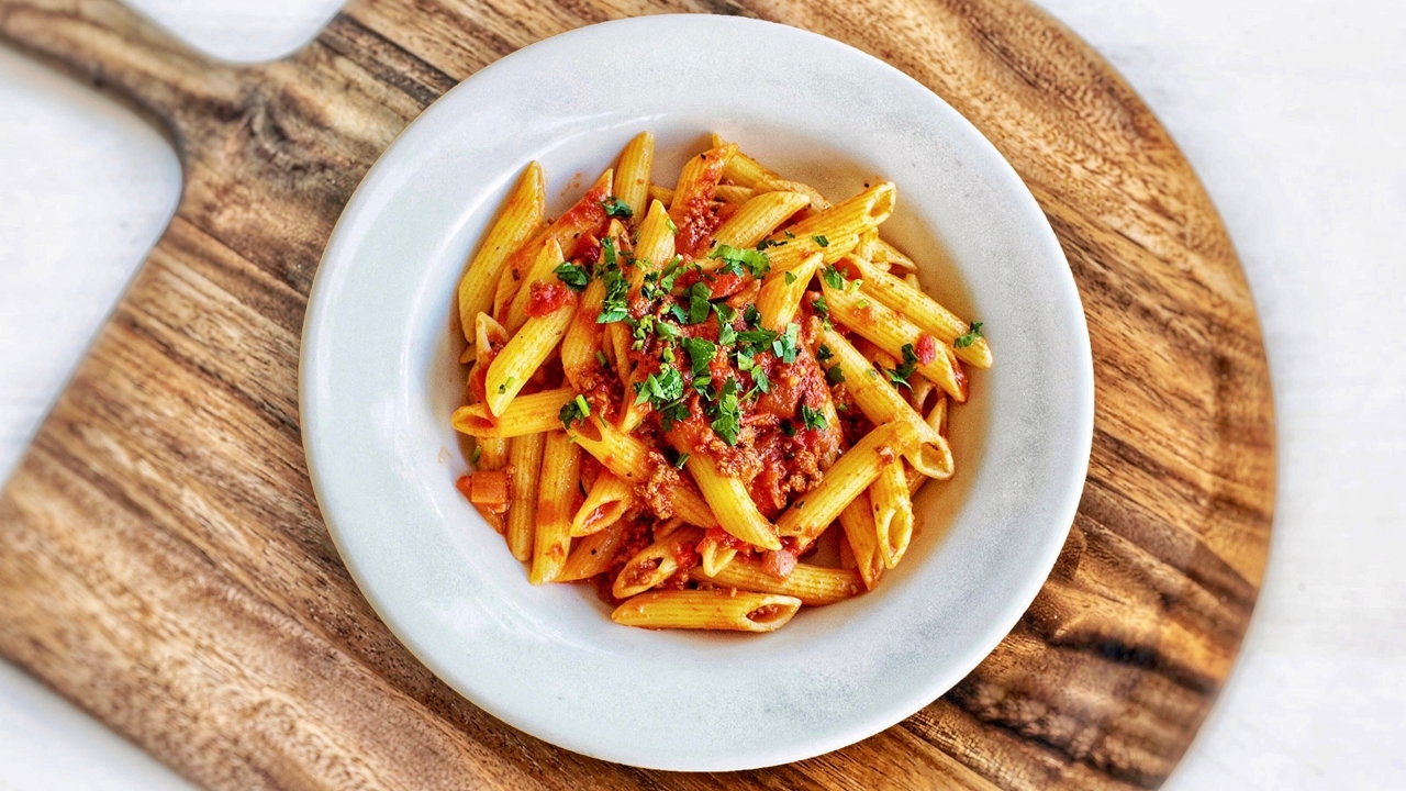 Order PENNE WITH MEAT SAUCE food online from Amicis East Coast Pizzeria store, Menlo Park on bringmethat.com