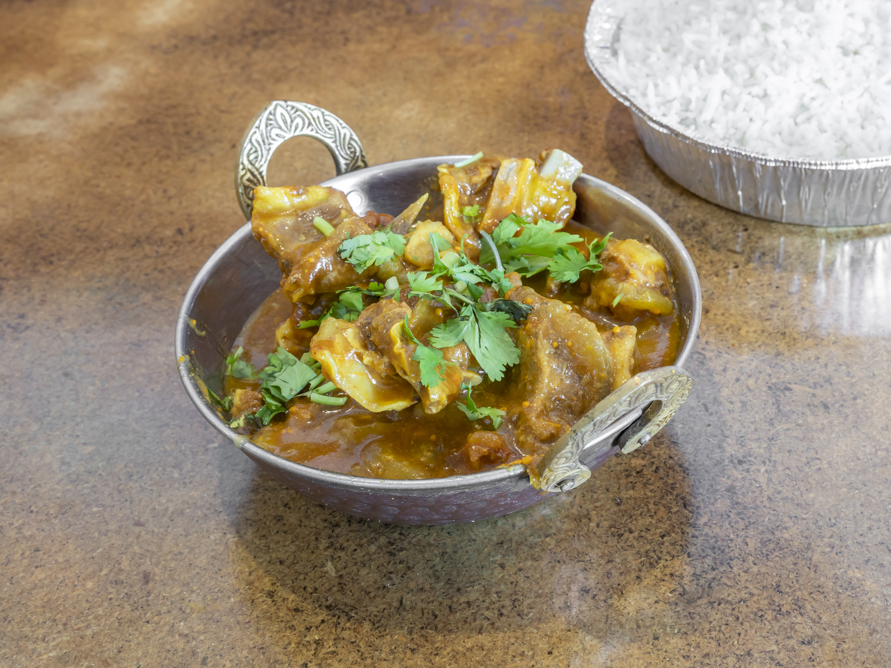 Order Goat Curry  food online from Little India store, Macon on bringmethat.com