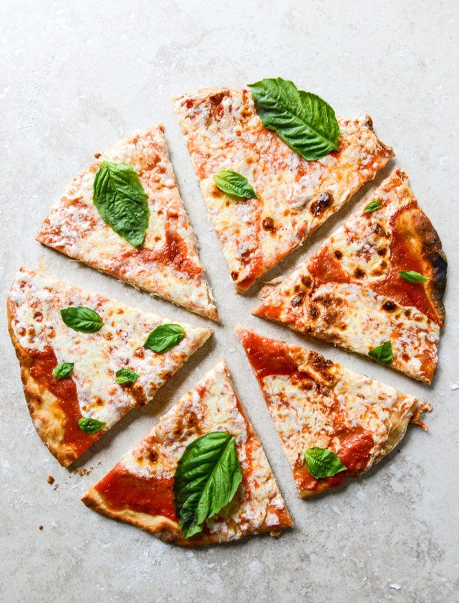Order The Margherita Pizza food online from Midtown Pizza store, Dallas on bringmethat.com