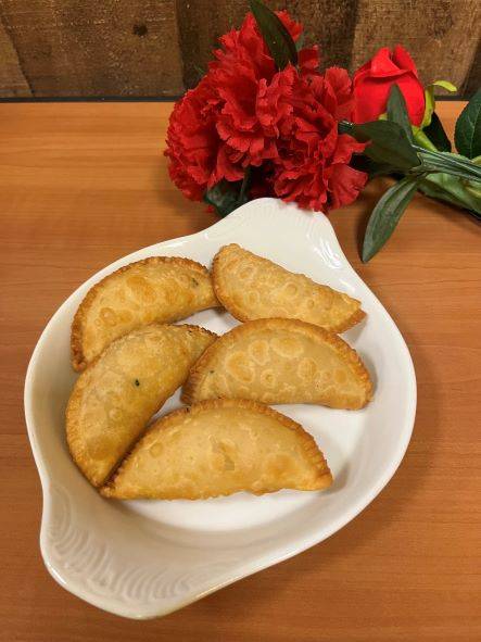 Order COCONUT SAMOSA  (3 pcs) food online from INDIAN GRILL RESTAURANT store, Norcross on bringmethat.com
