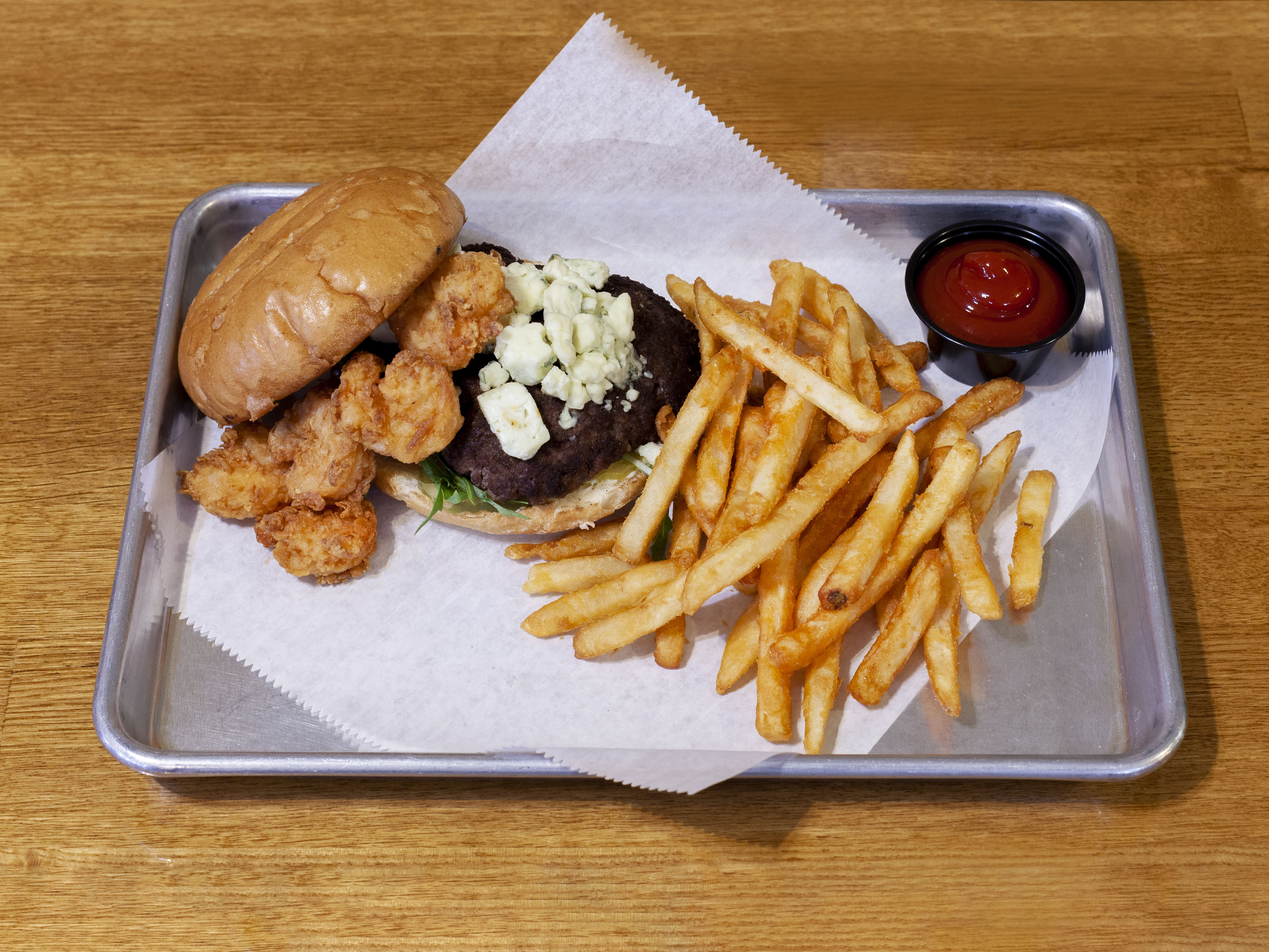 Order Surf and Turf Burger with Fries food online from Taste of Louisiana (TOLA) Cafe store, Denham Springs on bringmethat.com