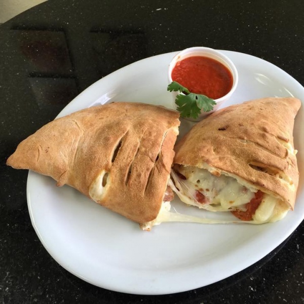 Order Meat Lovers Calzone food online from Aliacci Pizza & Pasta store, Lakewood on bringmethat.com