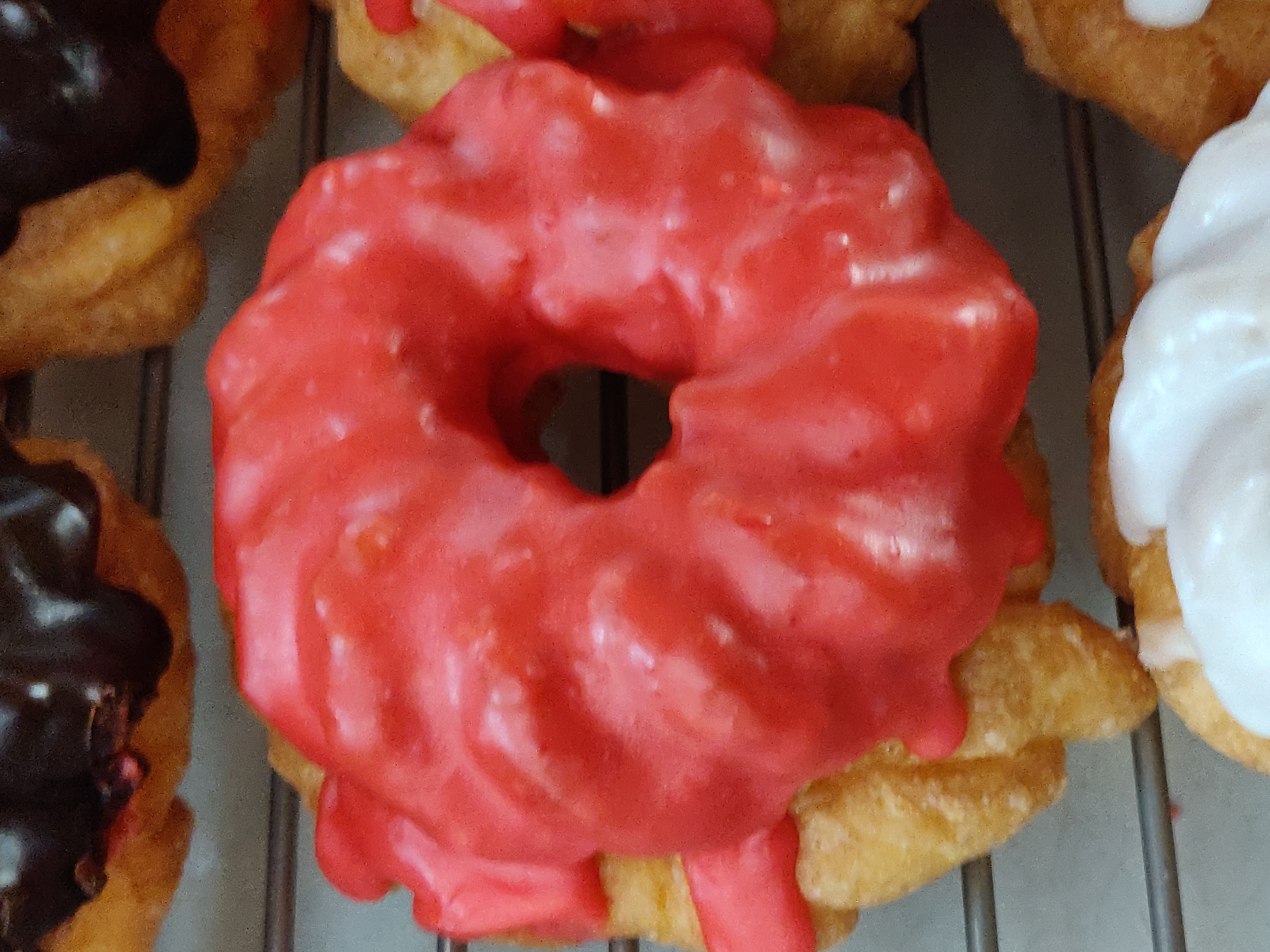 Order Strawberry Icing French Cruller food online from Donut Club store, San Dimas on bringmethat.com