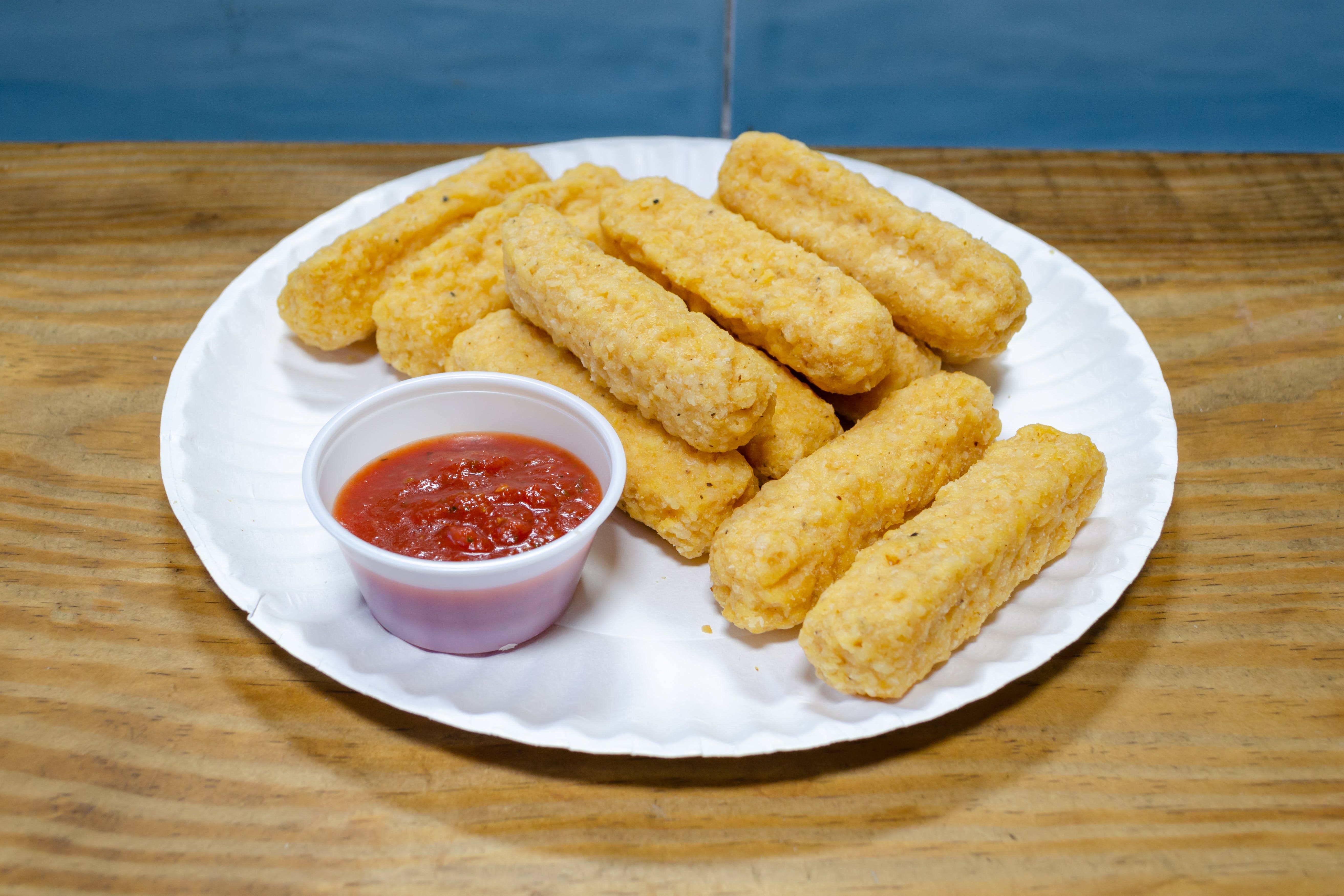 Order Mozzarella Sticks - 6 Pieces food online from 99¢ Pizza & Hot Dog store, New York on bringmethat.com