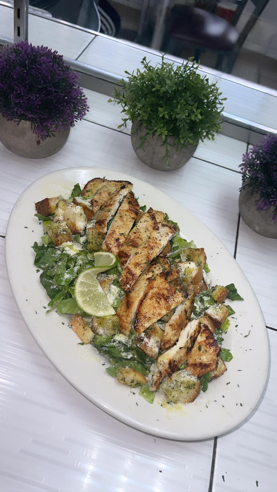 Order Grill Chicken Caesar Salad food online from Johnny's Pizza Diner store, Bronx on bringmethat.com