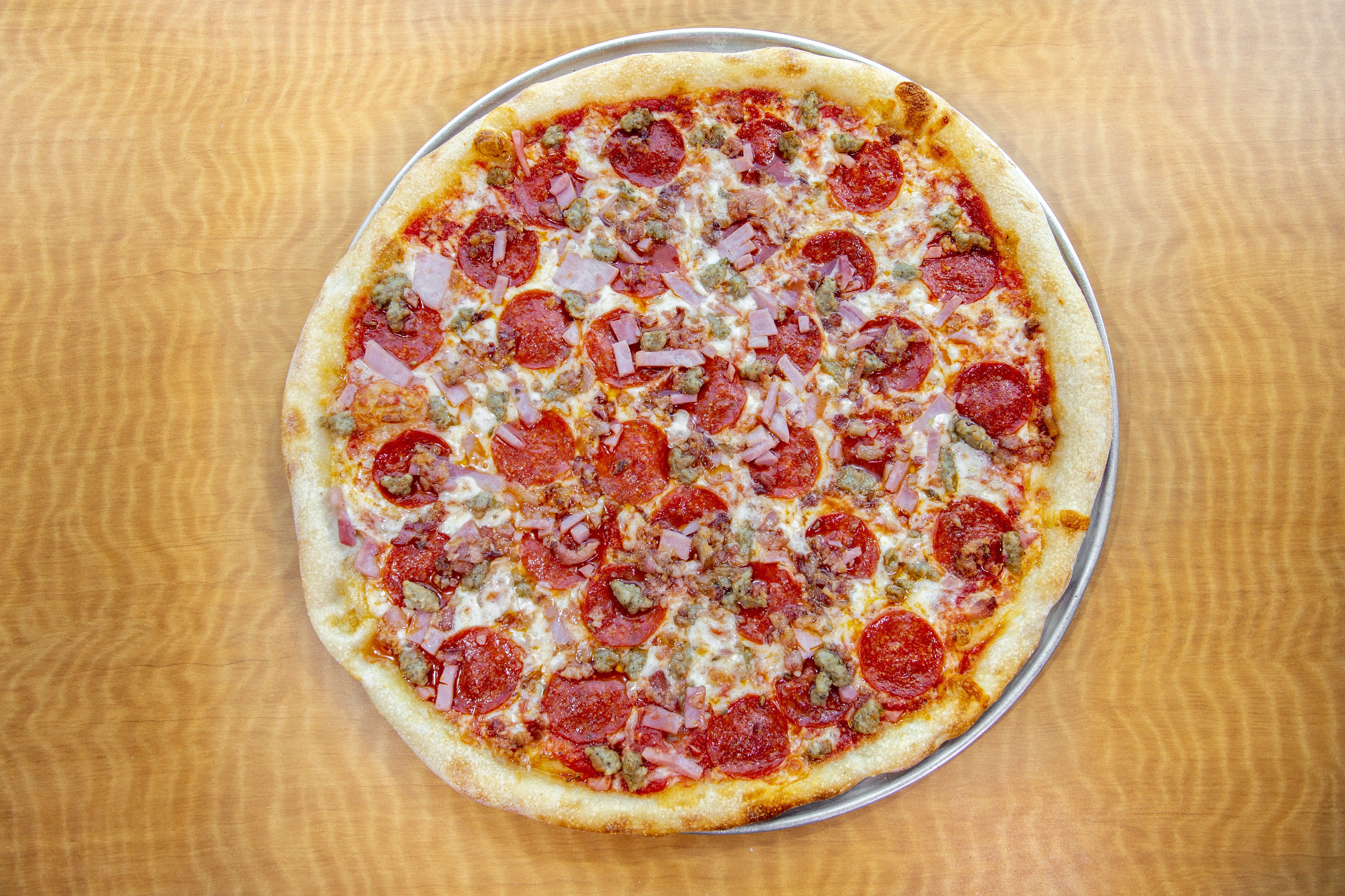 Order Meat Lovers Pizza - Small 14'' food online from Mario Cafe & Pizzeria store, East Greenville on bringmethat.com