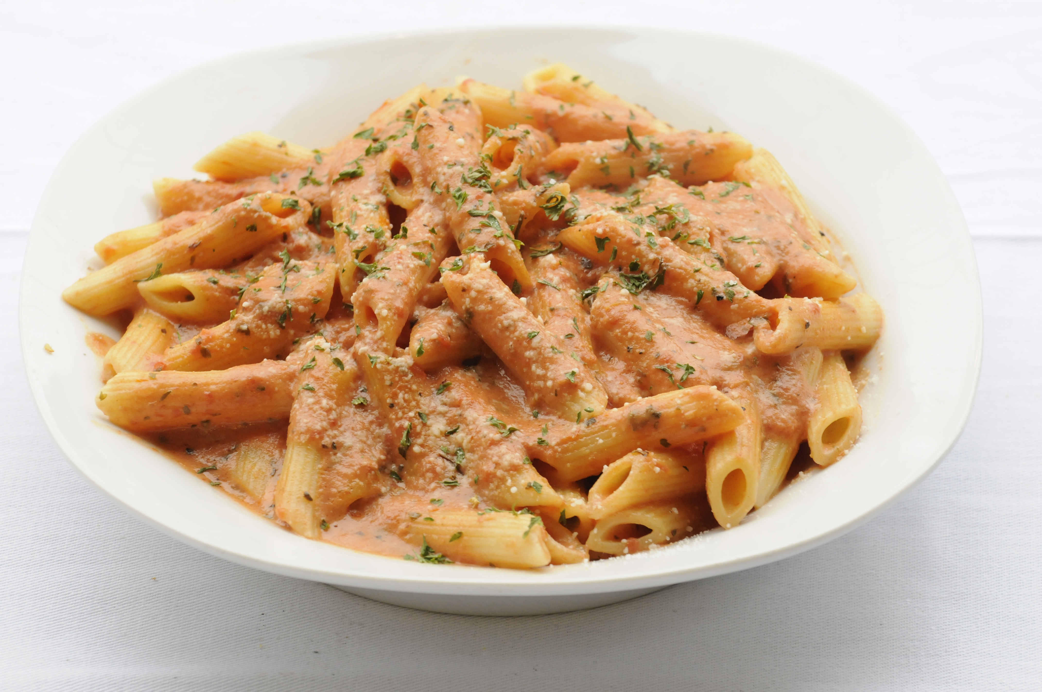 Order Penne alla Vodka food online from Roberto's Pizza & Pasta store, New Rochelle on bringmethat.com