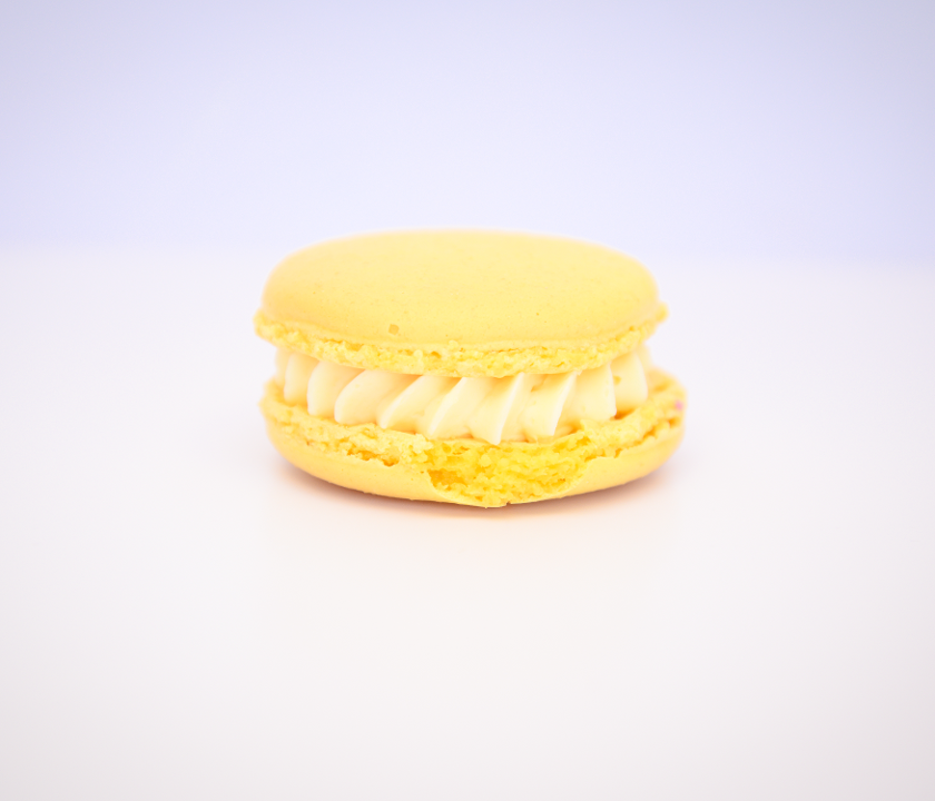 Order Limoncello Macaron food online from Pietro's Bakery & Cafe store, Frisco on bringmethat.com