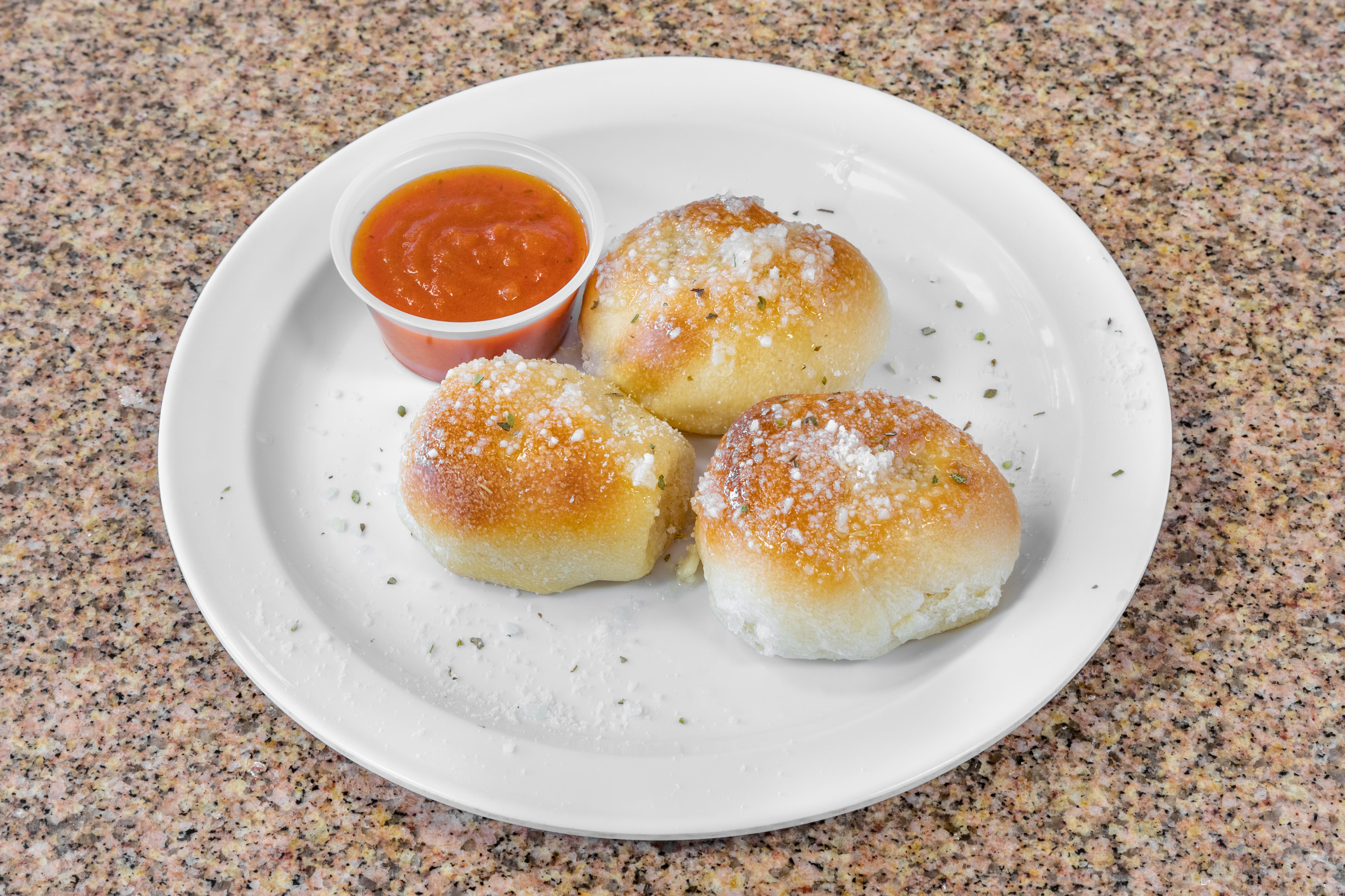 Order Garlic Knots - 6 Pieces food online from Taste of Italy Pizza and Pasta store, Goodyear on bringmethat.com