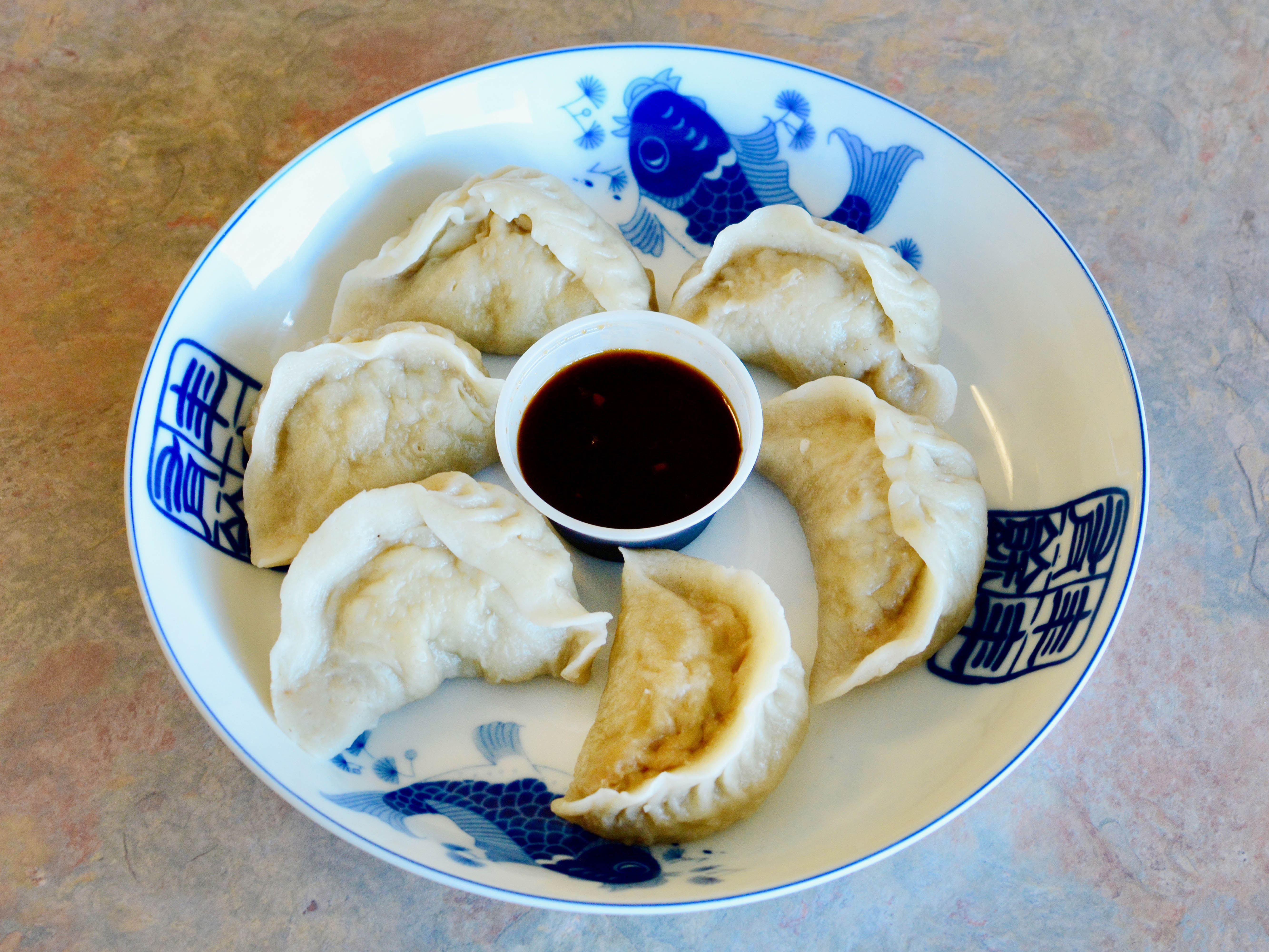Order 5. Steamed Dumplings food online from Oriental Express store, Sterling on bringmethat.com