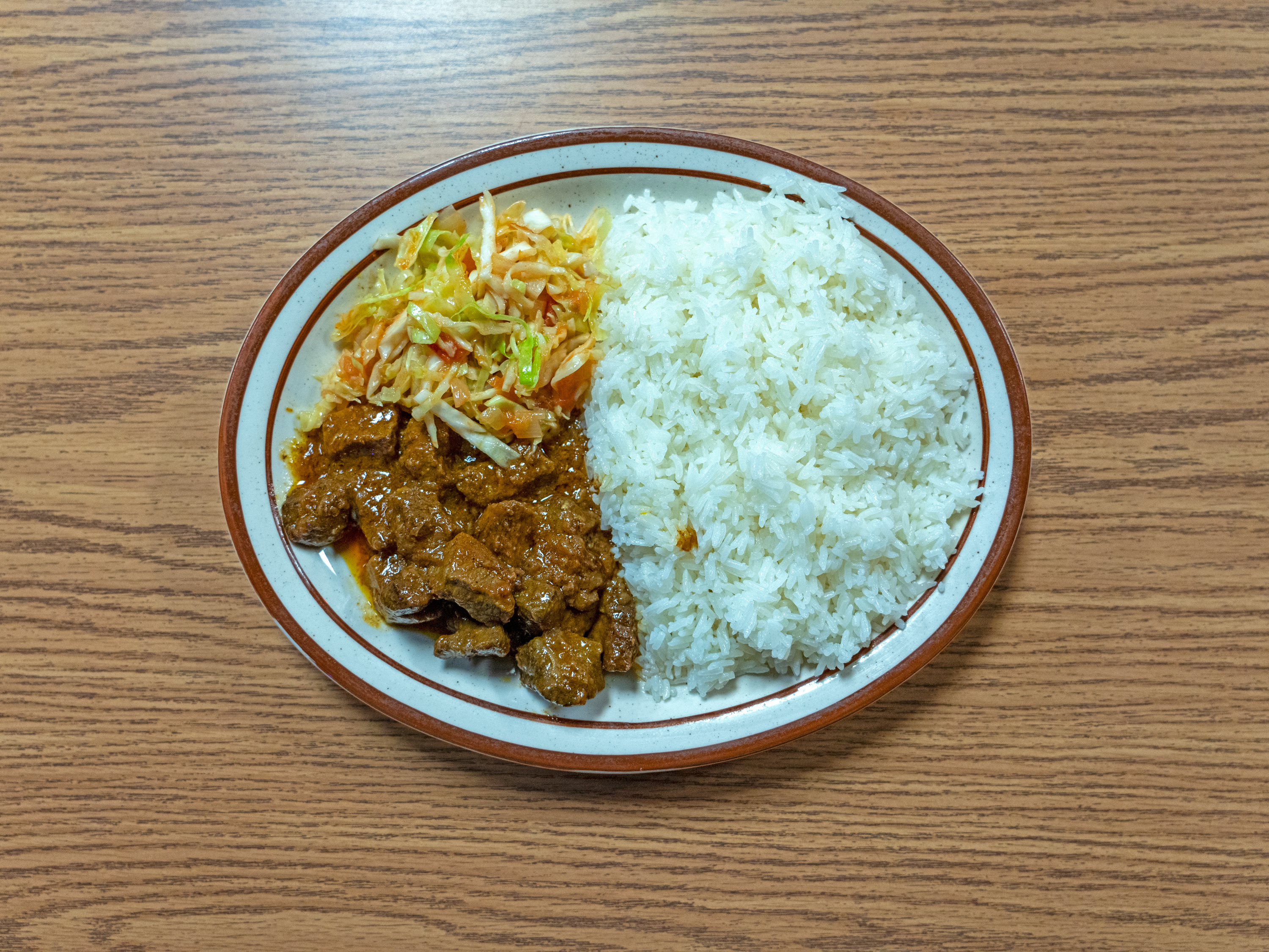 Order Rice and Stewed Beef food online from International Fuse Bar & Grill store, South Bend on bringmethat.com