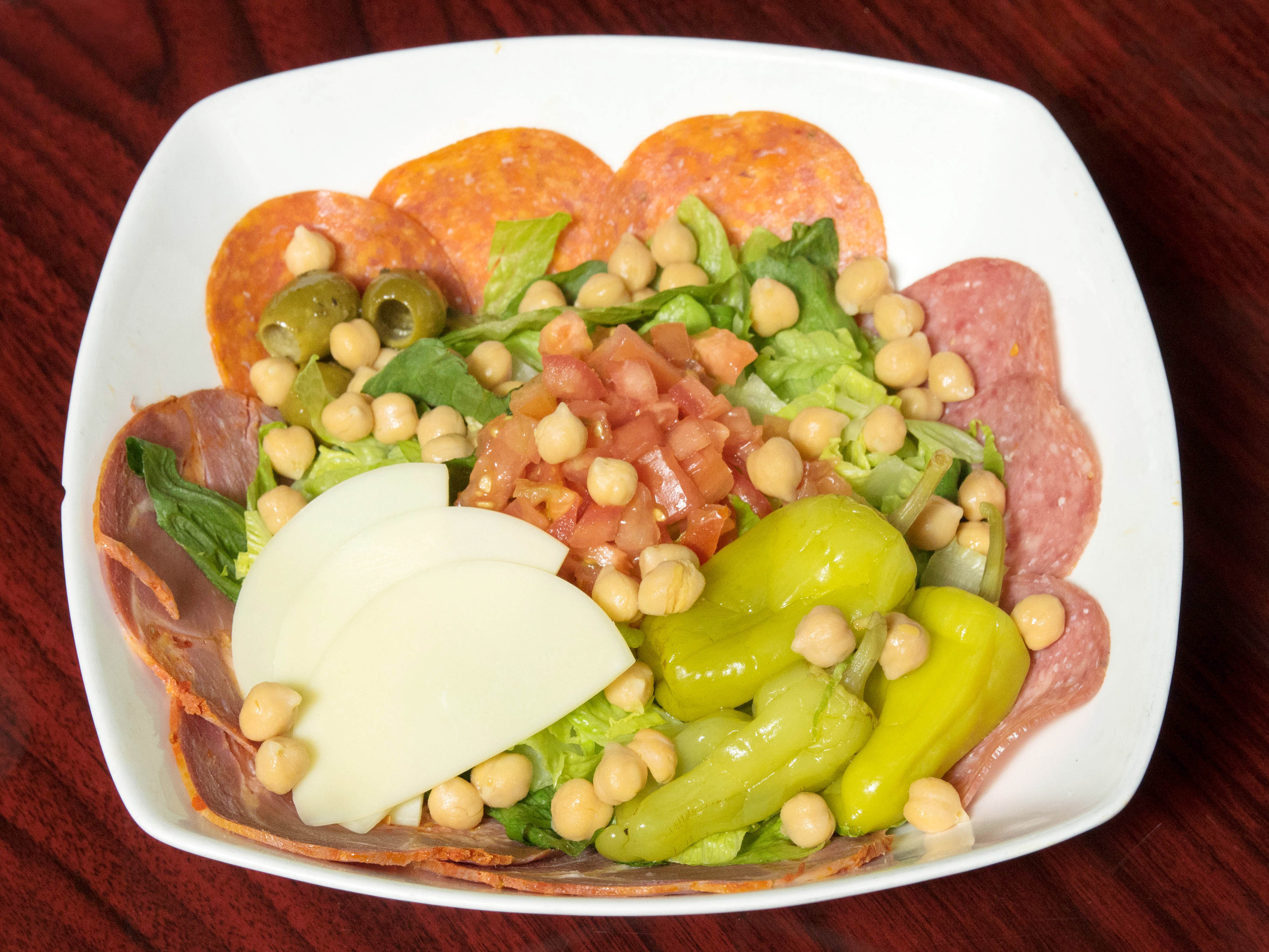 Order Antipasto Salad food online from Nicolosi's Italian Restaurant store, San Diego on bringmethat.com