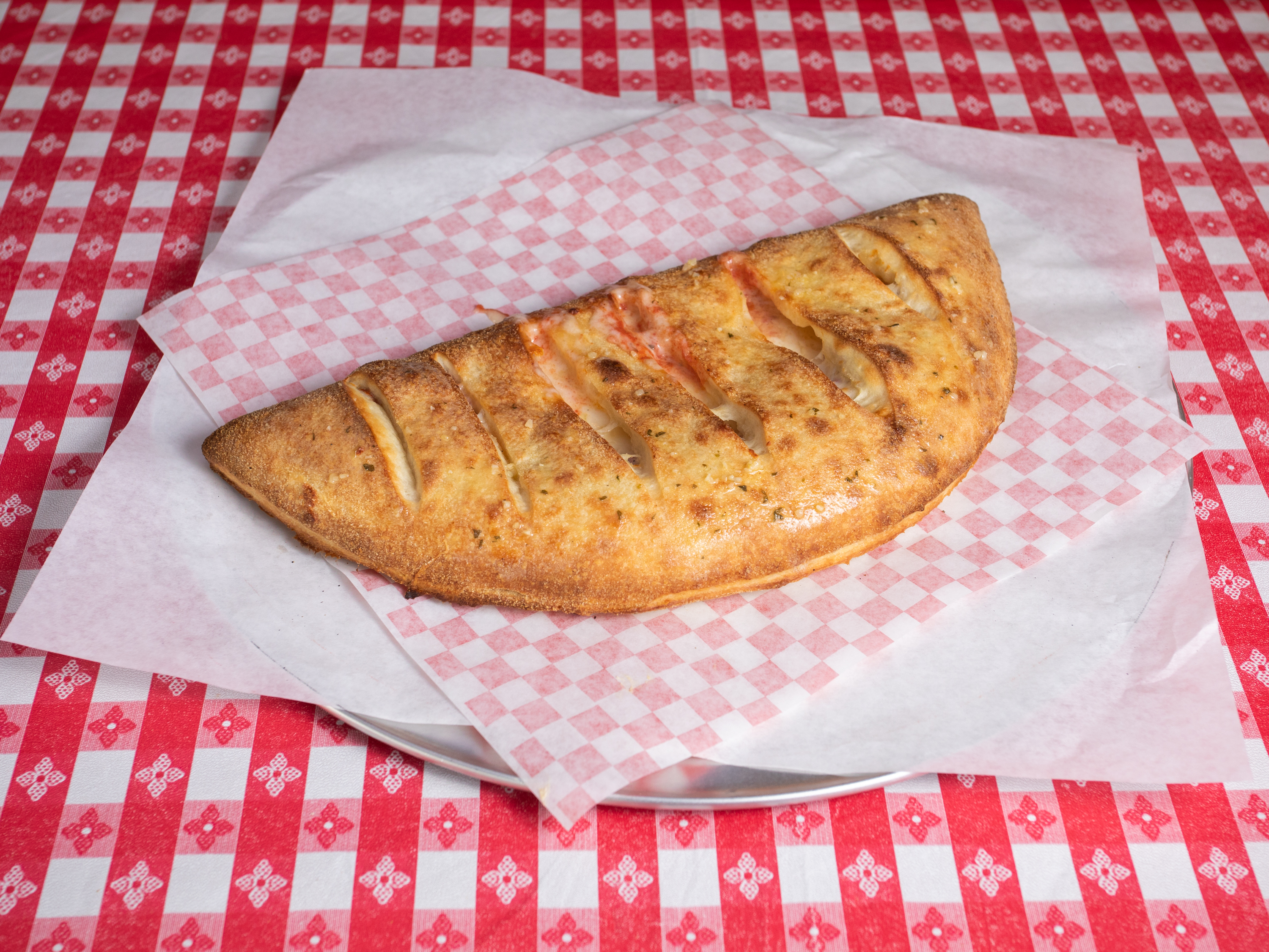 Order Cheese Calzone food online from Pizza Joint store, San Francisco on bringmethat.com