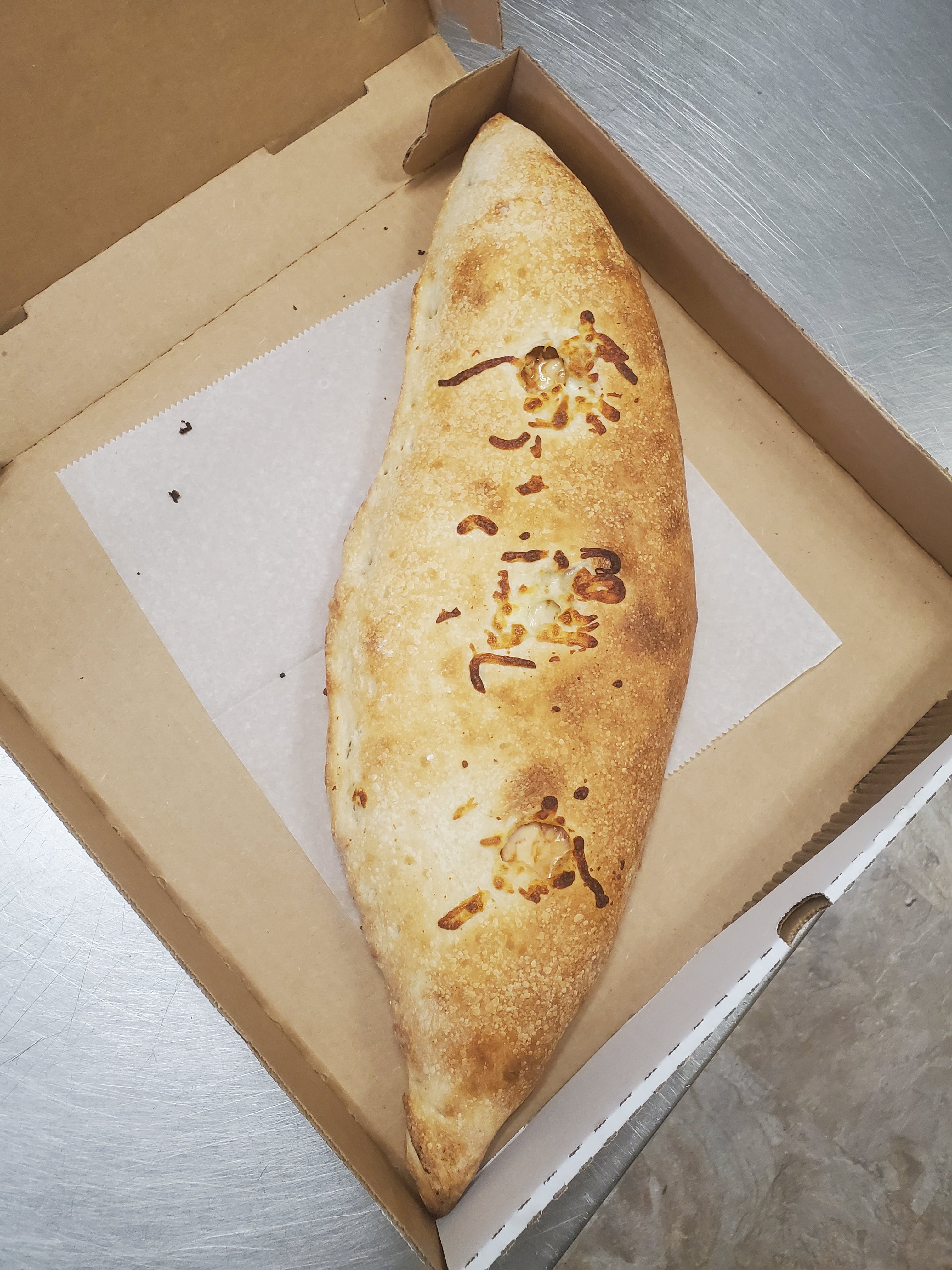 Order Combination Chicken Stromboli - Small food online from Philly Pizza Llc store, Newark on bringmethat.com