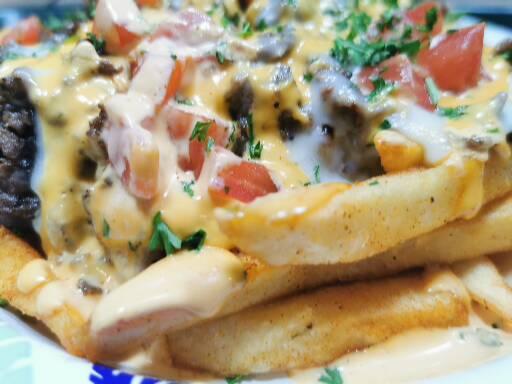 Order Cheesesteak Fries  food online from Flame Grill store, Newark on bringmethat.com
