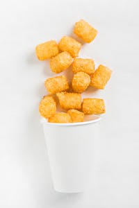 Order Spanish Fries (Tots) food online from Taco Box store, Portales on bringmethat.com