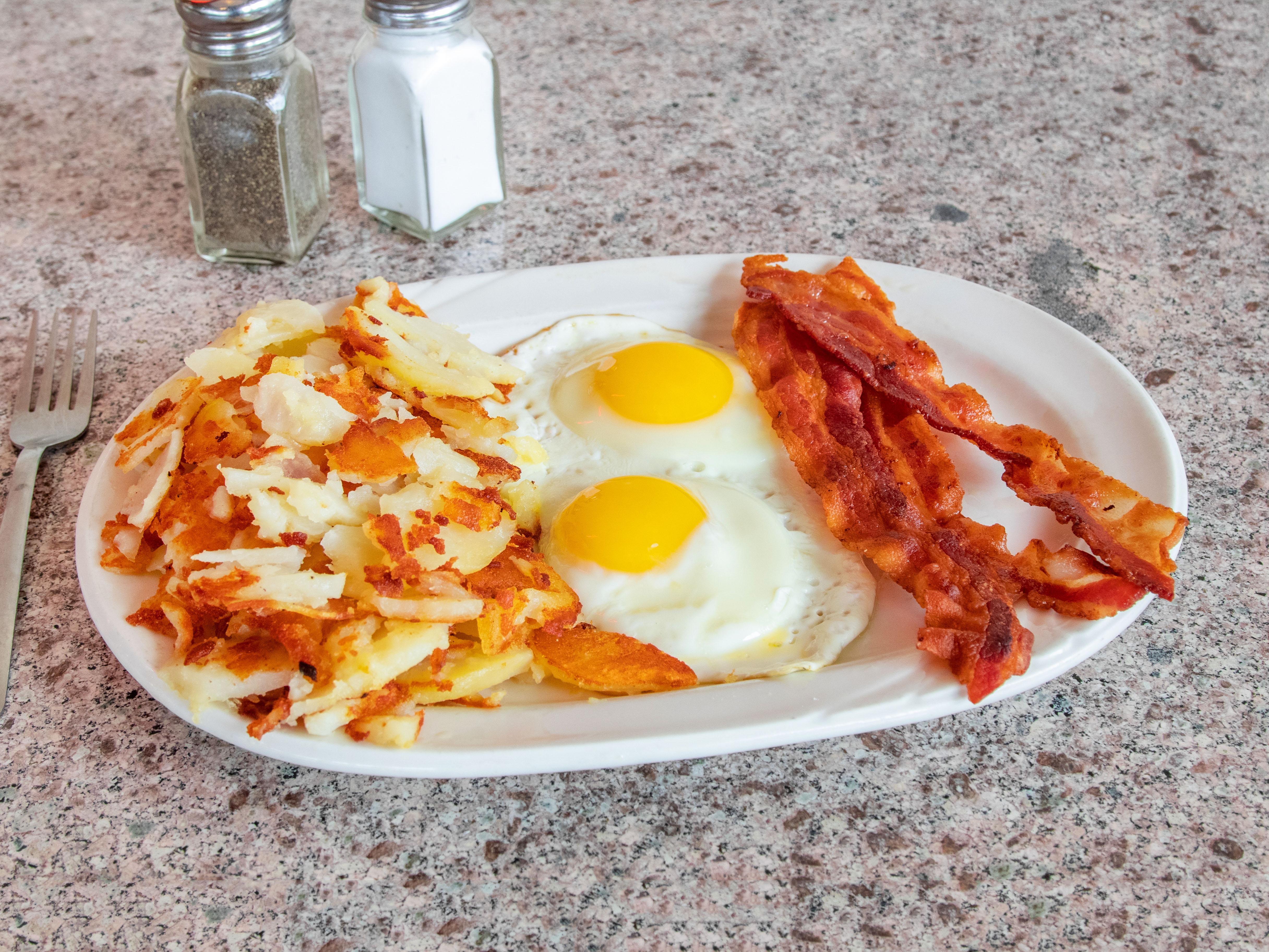 Order 2 Eggs Any Style with Bacon Breakfast food online from Sunrise Diner store, Allentown on bringmethat.com