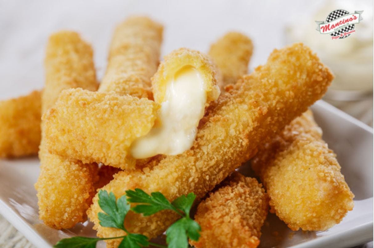 Order Oven Baked Mozzarella Sticks - Appetizer food online from Mancino Pizza & Grinders store, Fort Wayne on bringmethat.com
