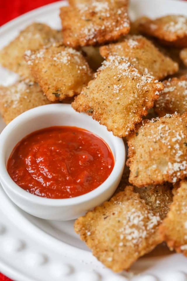 Order Three Cheese Fried Ravioli - 10 Pieces food online from Big Apple Pizza store, Virginia Beach on bringmethat.com