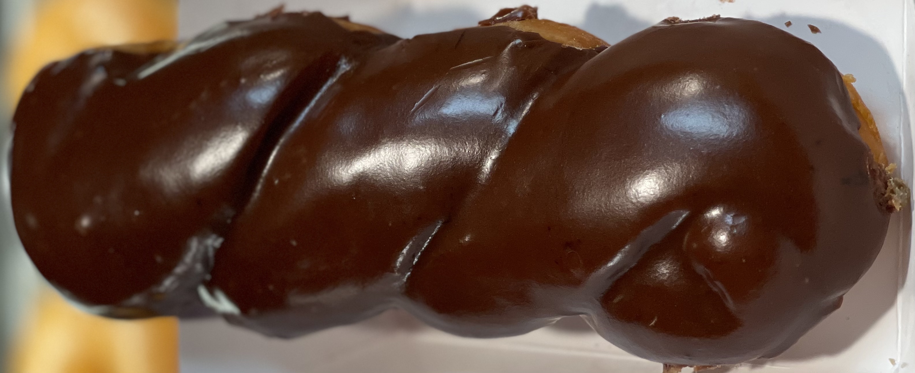 Order Chocolate Twist Donut  food online from Glaze Donuts store, Ceres on bringmethat.com