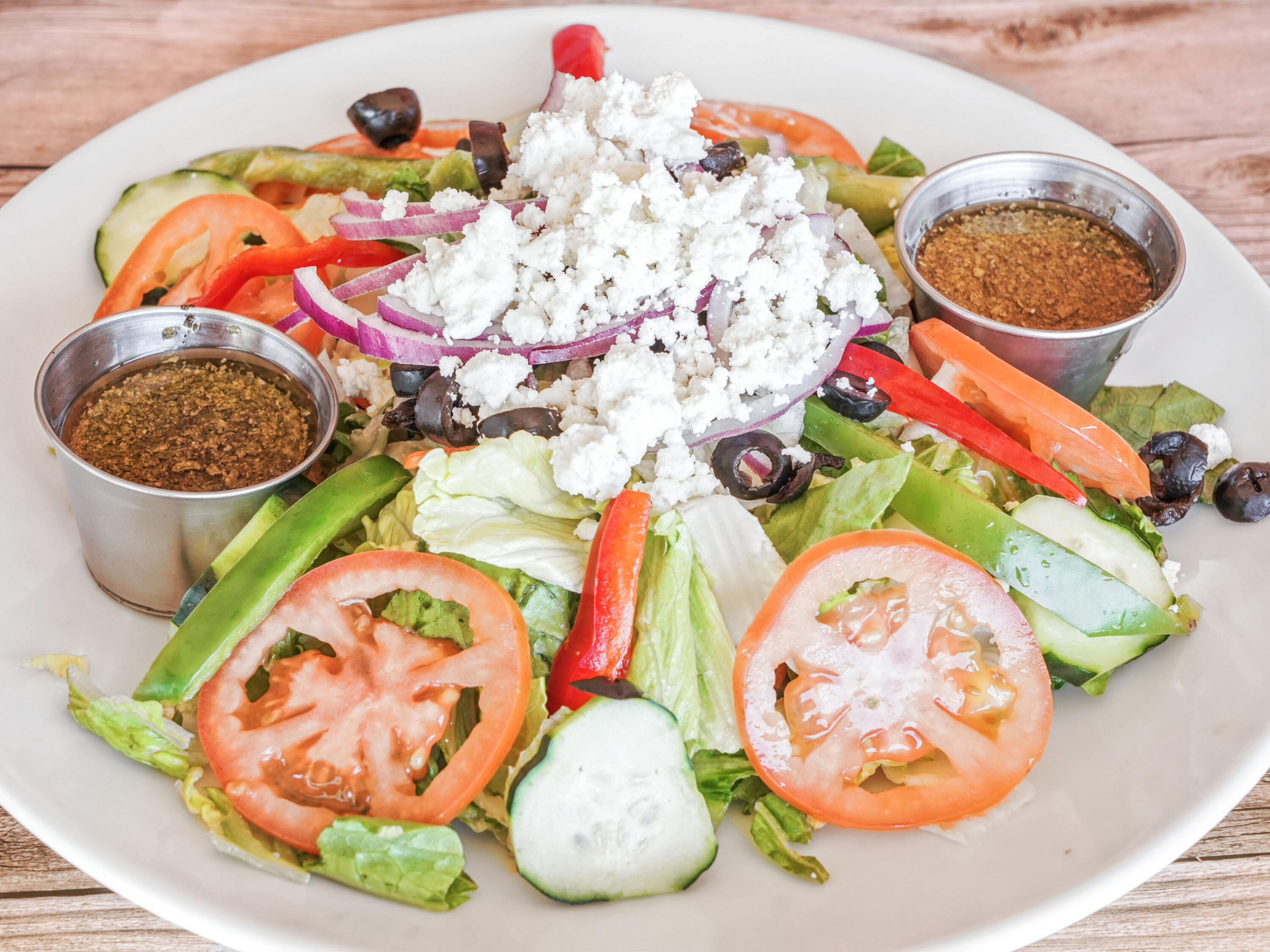 Order Famous Greek Salad food online from Santour Kabobery store, Simi Valley on bringmethat.com