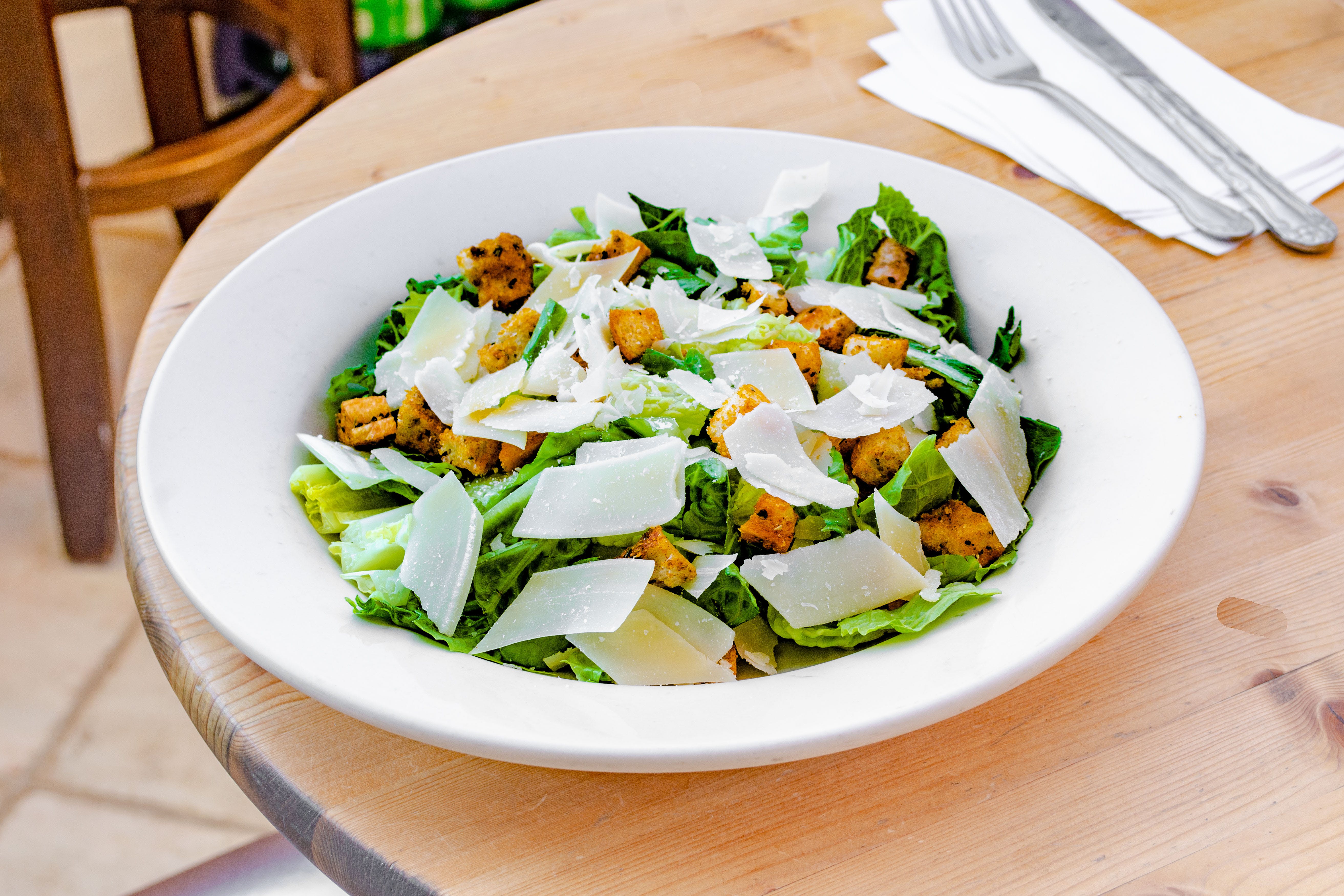 Order Caesar Salad - Salad food online from Pizza Station store, Katonah on bringmethat.com