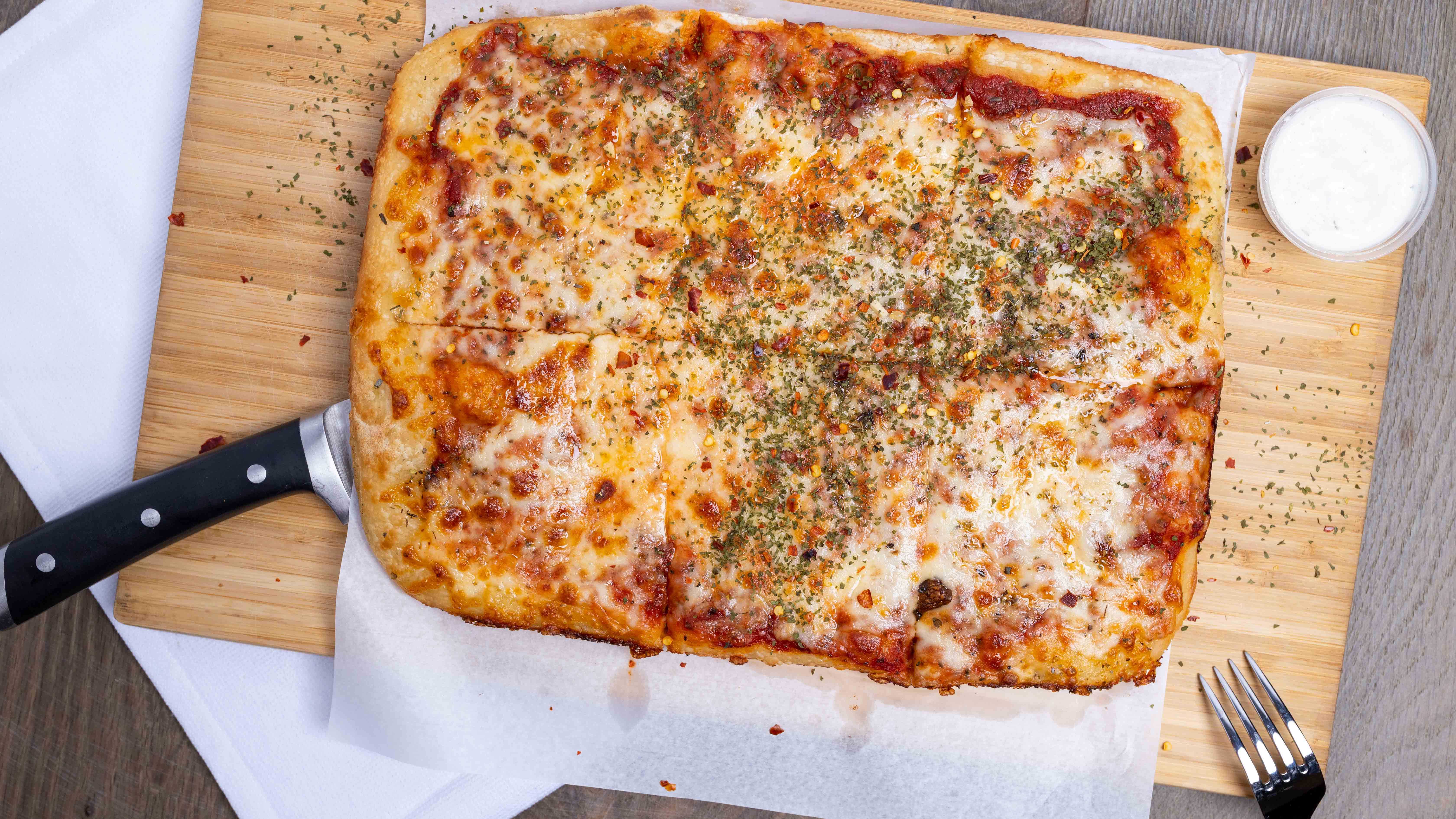 Order Cheese Pizza (1/4 Sheet) food online from Naked City Pizza store, Las Vegas on bringmethat.com