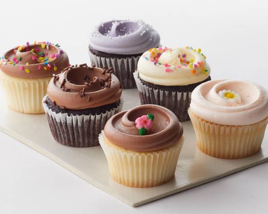 Order Classic Cupcake Assortment - 3 Van with Van Buttercream + 3 Choc with Choc Buttercream to go food online from Magnolia Bakery Bleecker Street store, New York on bringmethat.com