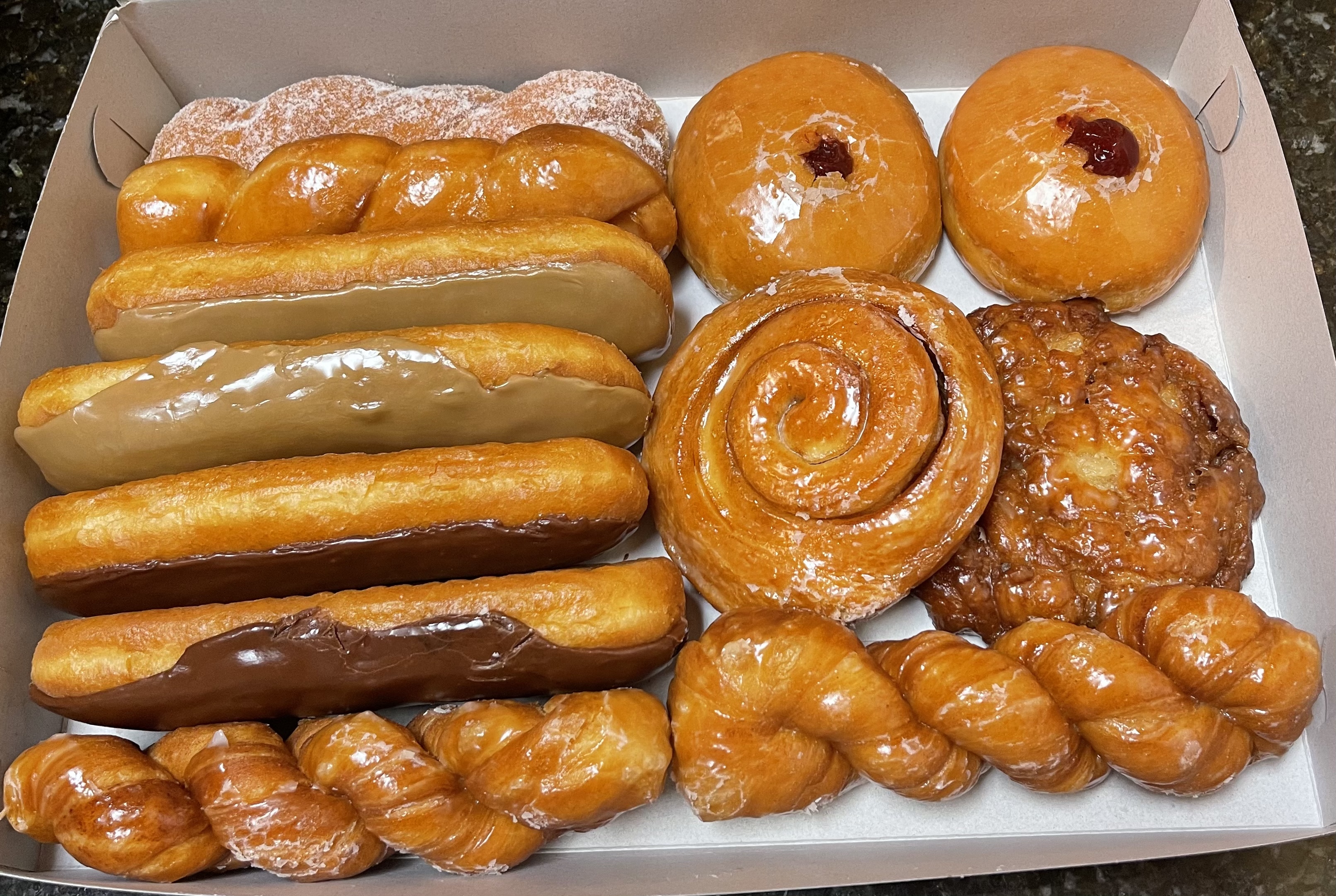 Order Fancy Dozen food online from Glaze Donuts store, Ceres on bringmethat.com