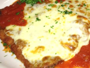 Order Veal Parmigiana - Entree food online from Mario The Baker store, Miami on bringmethat.com