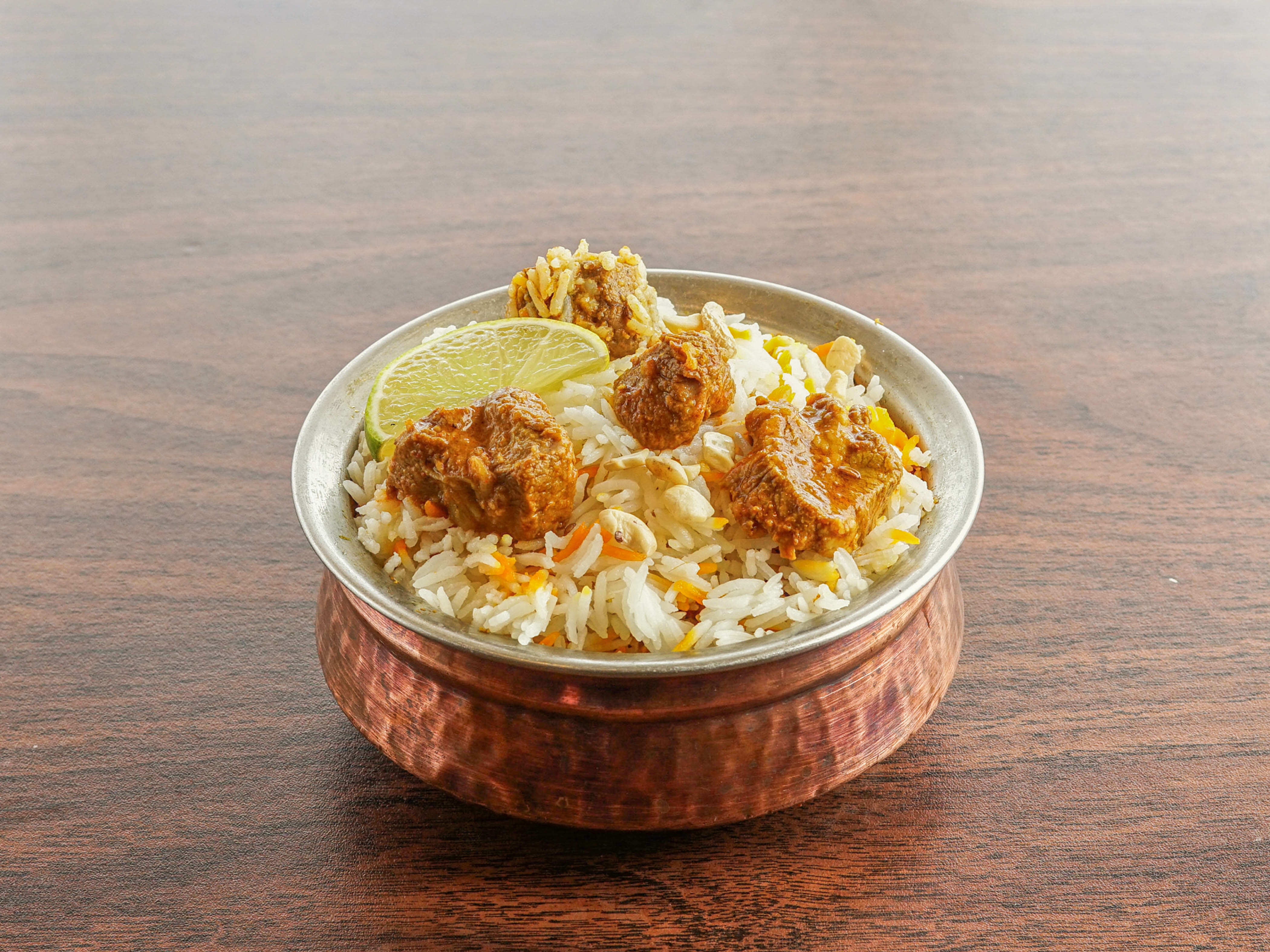 Order Lamb Biryani food online from Kitchen of India store, Parkville on bringmethat.com