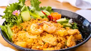 Order Pineapple Fried Rice Dinner  food online from Sweet basil thai cuisine store, Foster City on bringmethat.com