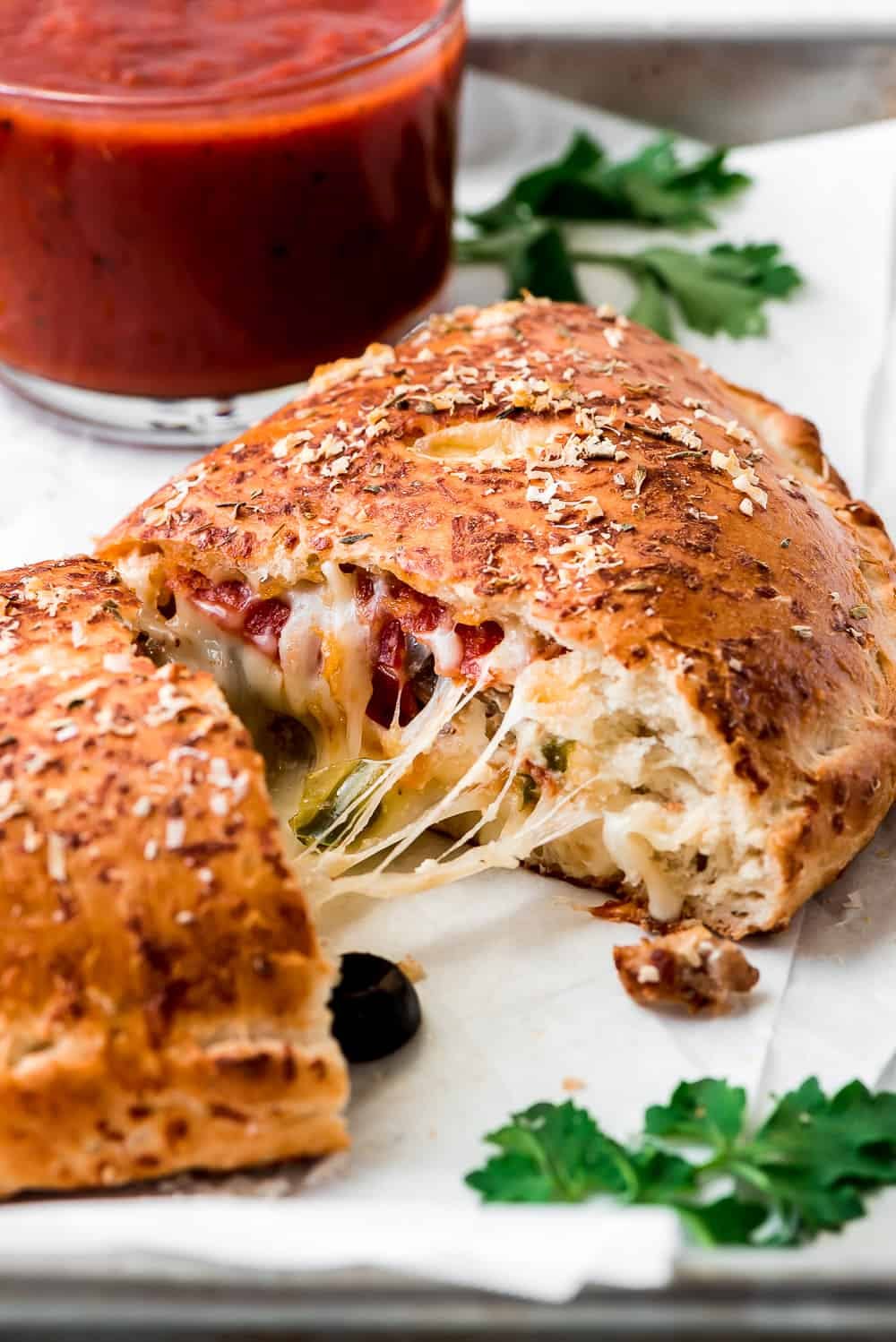 Order Spinach & Artichoke Calzone - Calzone food online from Sicilian Pizza store, Alexandria on bringmethat.com