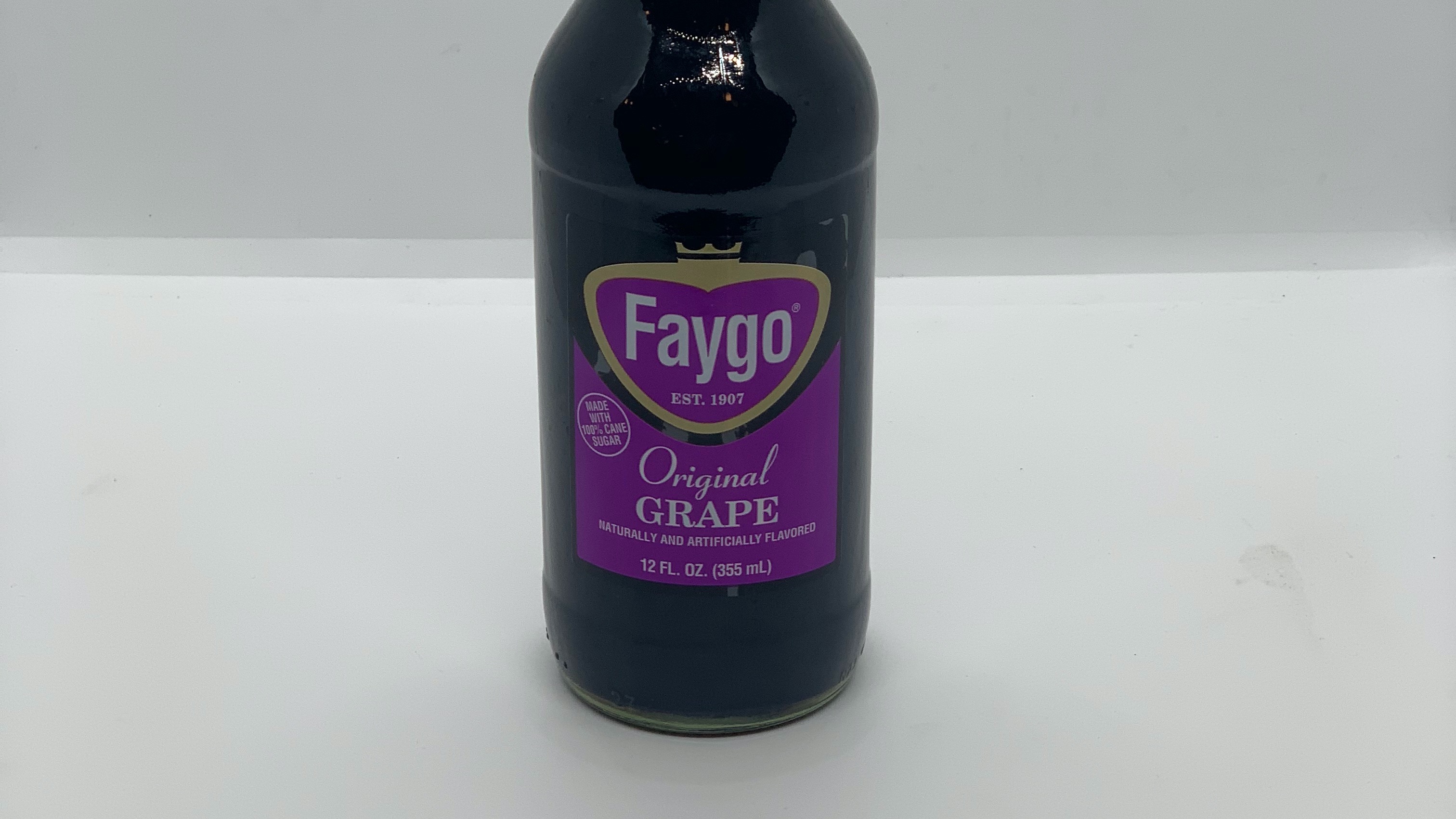 Order Faygo Grape Soda/pop food online from Dtown Pizzeria store, Los Angeles on bringmethat.com