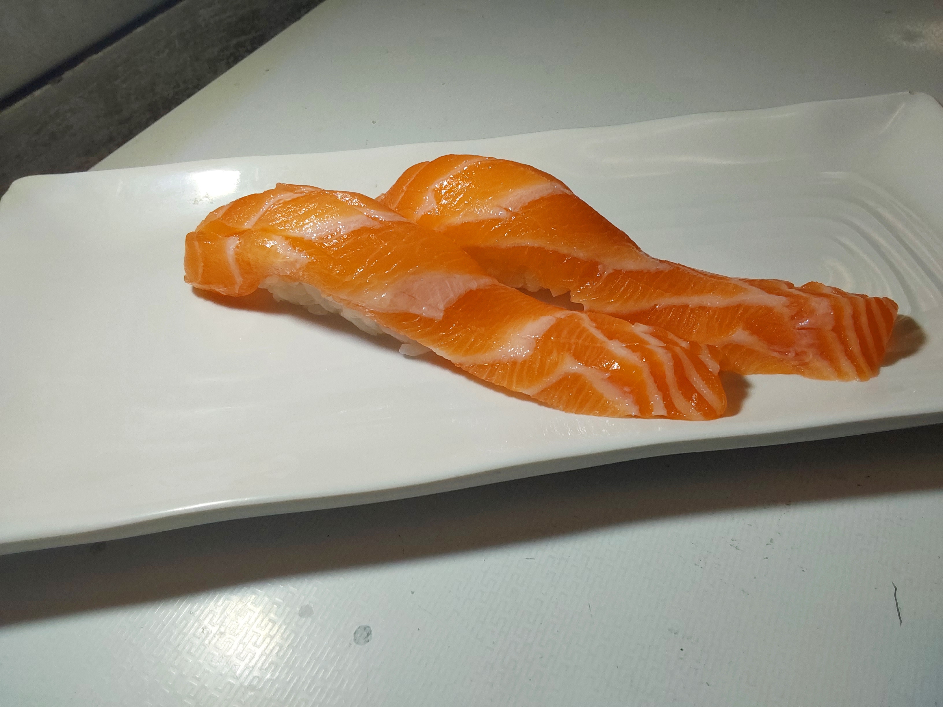 Order Salmon Nigiri 2 pcs food online from Sushi Yukiya store, Oceanside on bringmethat.com