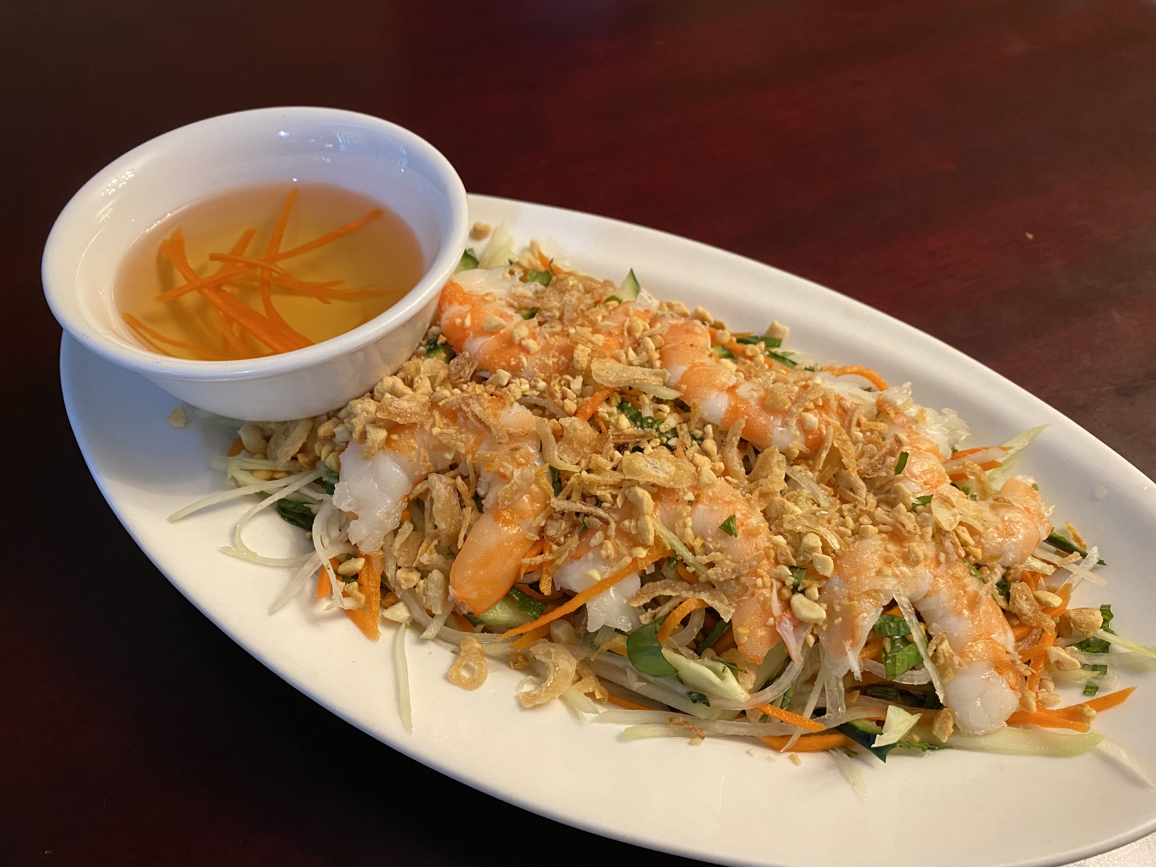 Order A4. Papaya Salad food online from Bac Lieu Restaurant store, San Francisco on bringmethat.com