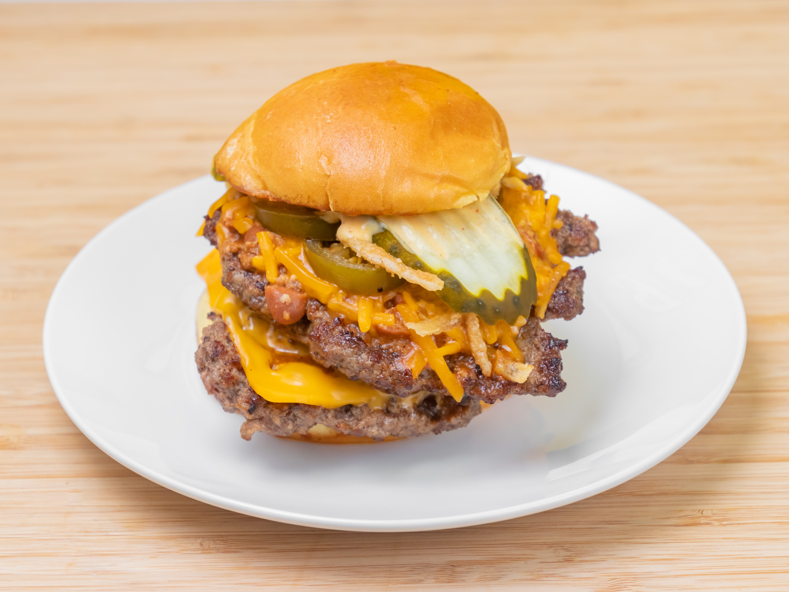 Order Texan Burger food online from Bud Burger & Steak store, Suwanee on bringmethat.com