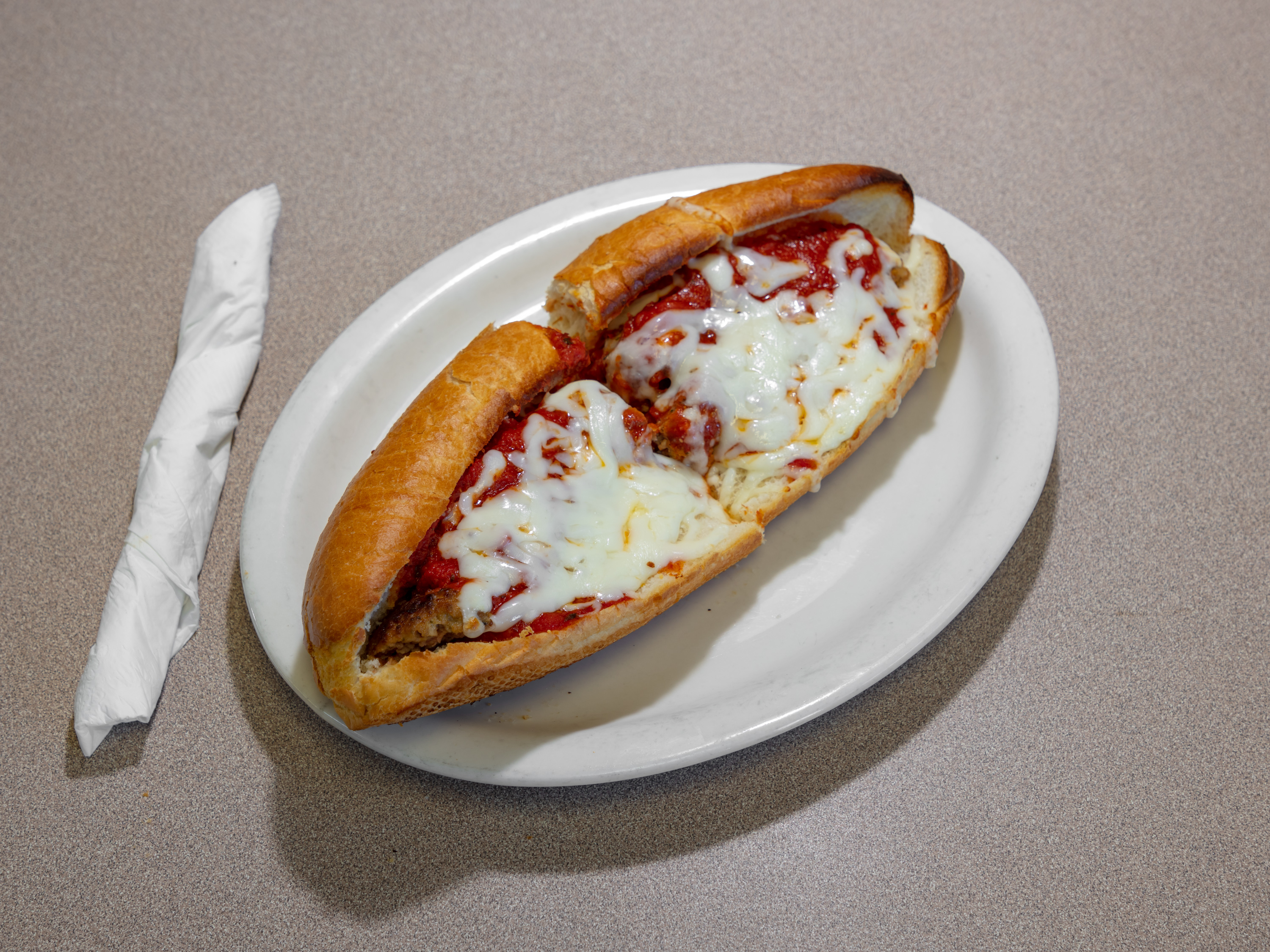 Order Meatball Parmigiana Hot Sub food online from Goodfellas Pizza & Subs store, Wylie on bringmethat.com