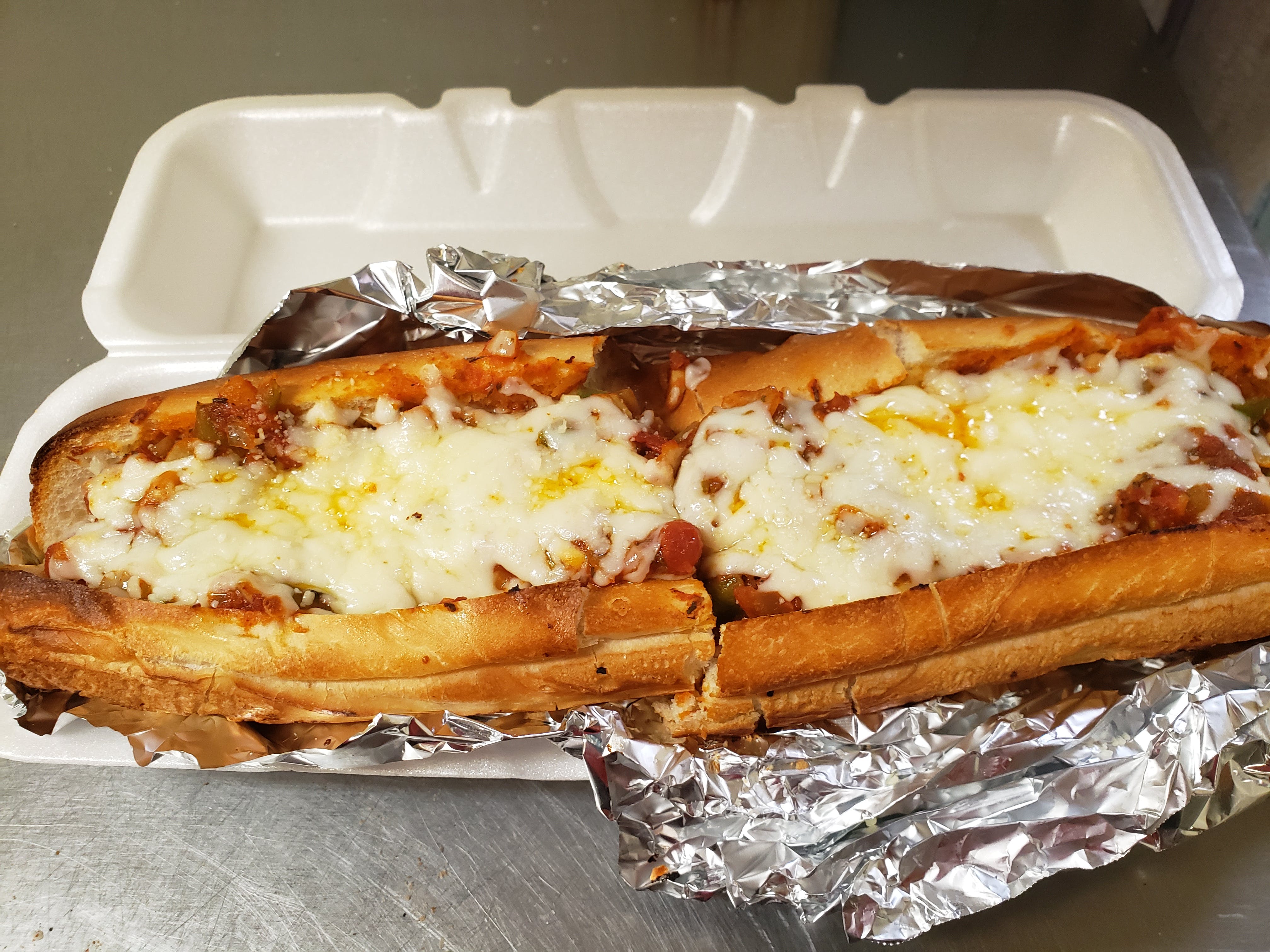 Order Meatball Parmigiana Sub - 8" food online from Aly's Family Italian Restaurant store, Christiansburg on bringmethat.com