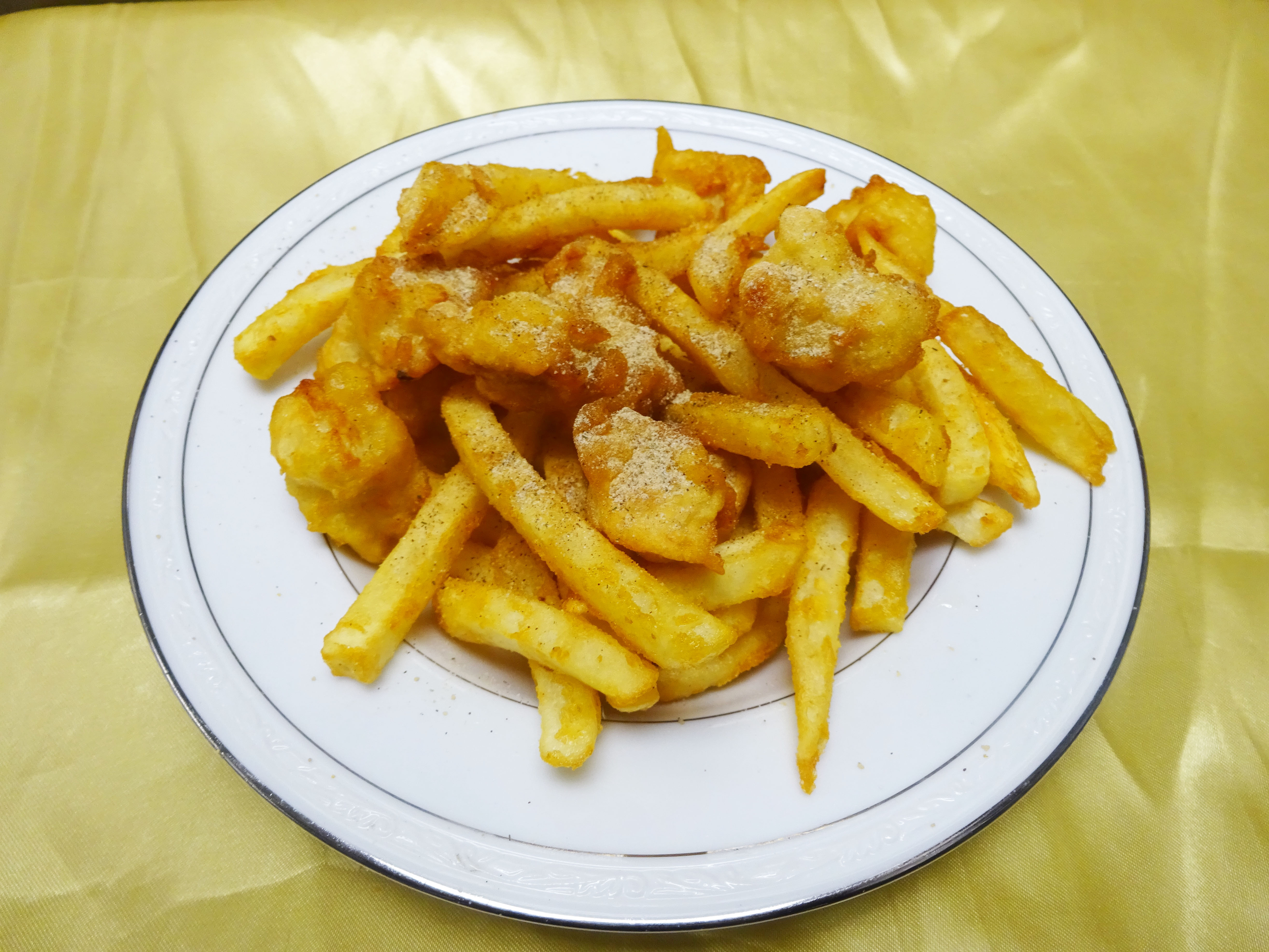 Order A6. Popcorn Chicken and Fries food online from Z's Kitchen store, Orange on bringmethat.com