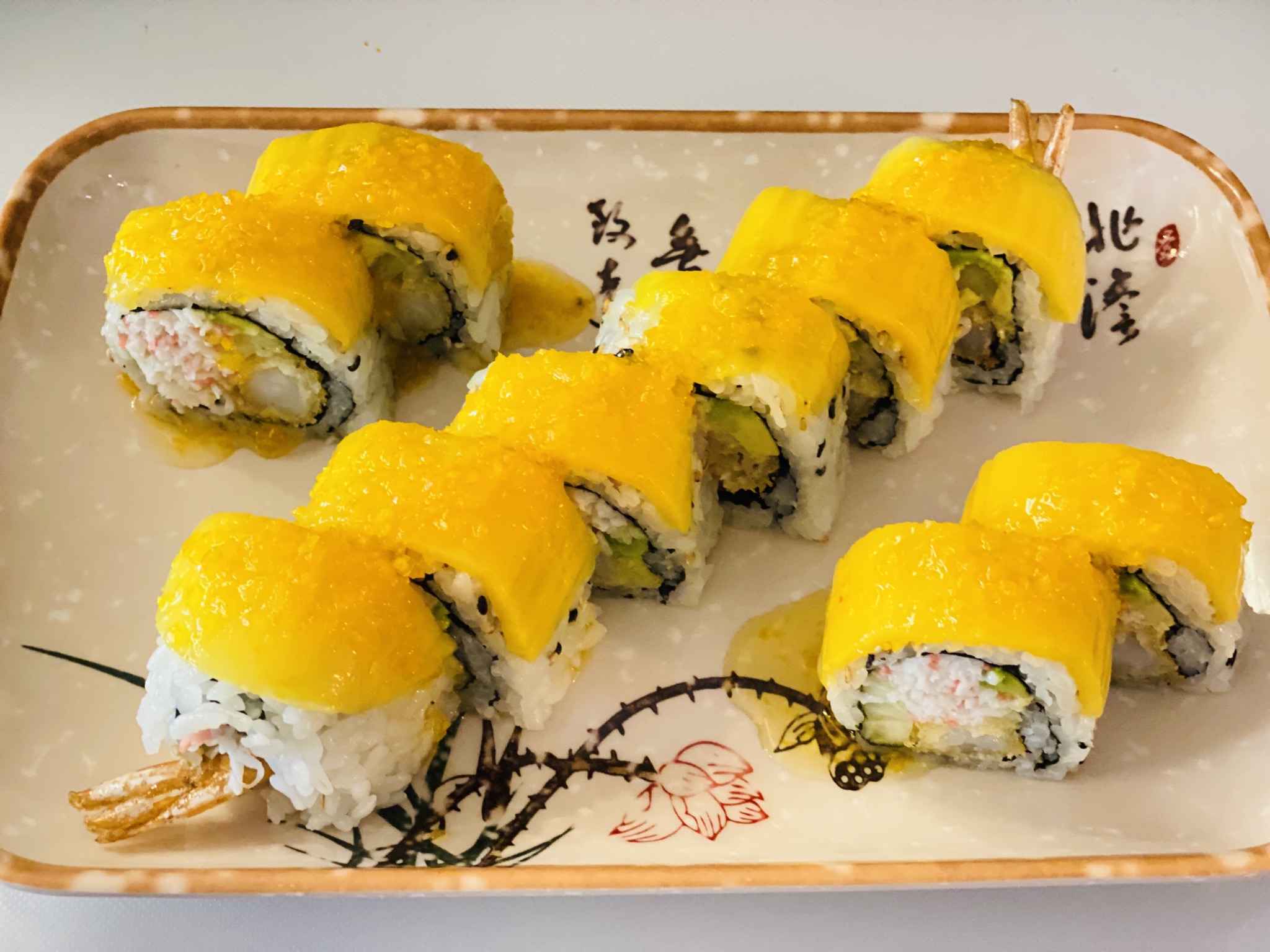 Order 94. Golden Mango Roll 黄金芒果卷 food online from Tengu Sushi store, Newport on bringmethat.com