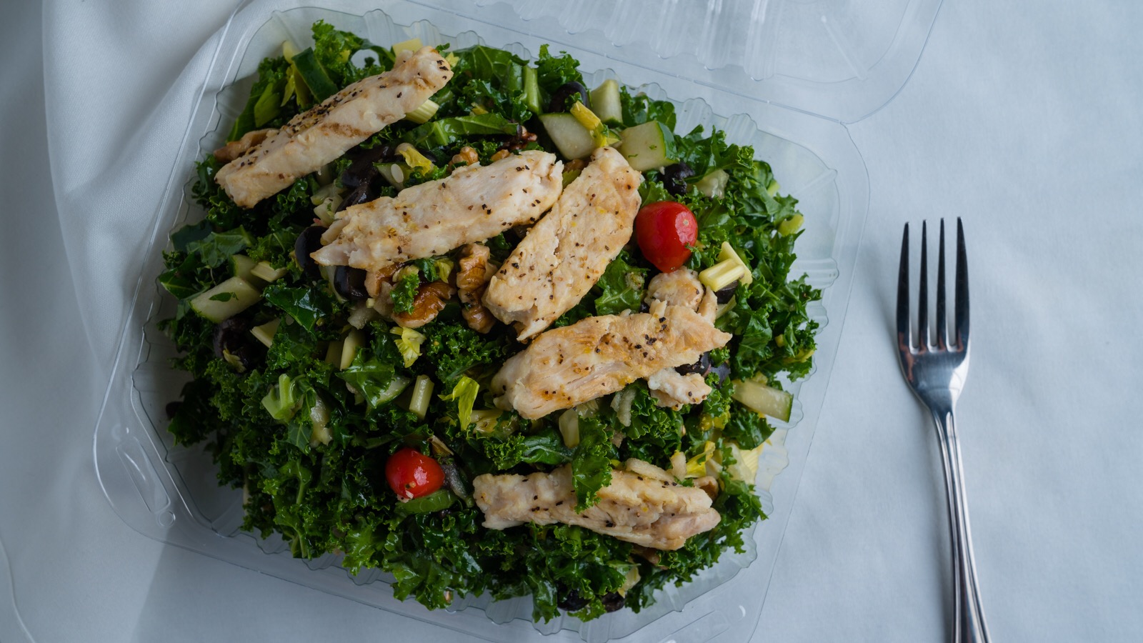 Order Tossed Kale Salad food online from Juice Kaboose store, San Diego on bringmethat.com