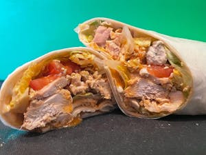 Order The Buffalo Wrap food online from Nunnu Sandwich Shop store, Monroe on bringmethat.com