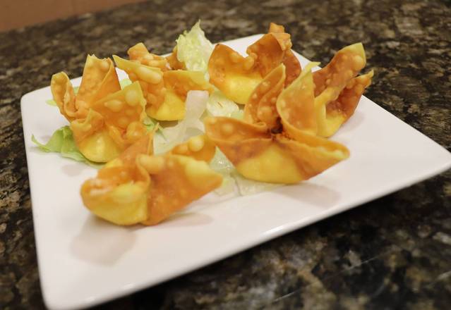 Order Crab Rangoon (6 pcs) food online from Golden Crown Chinese-American Restaurant store, Amherst on bringmethat.com