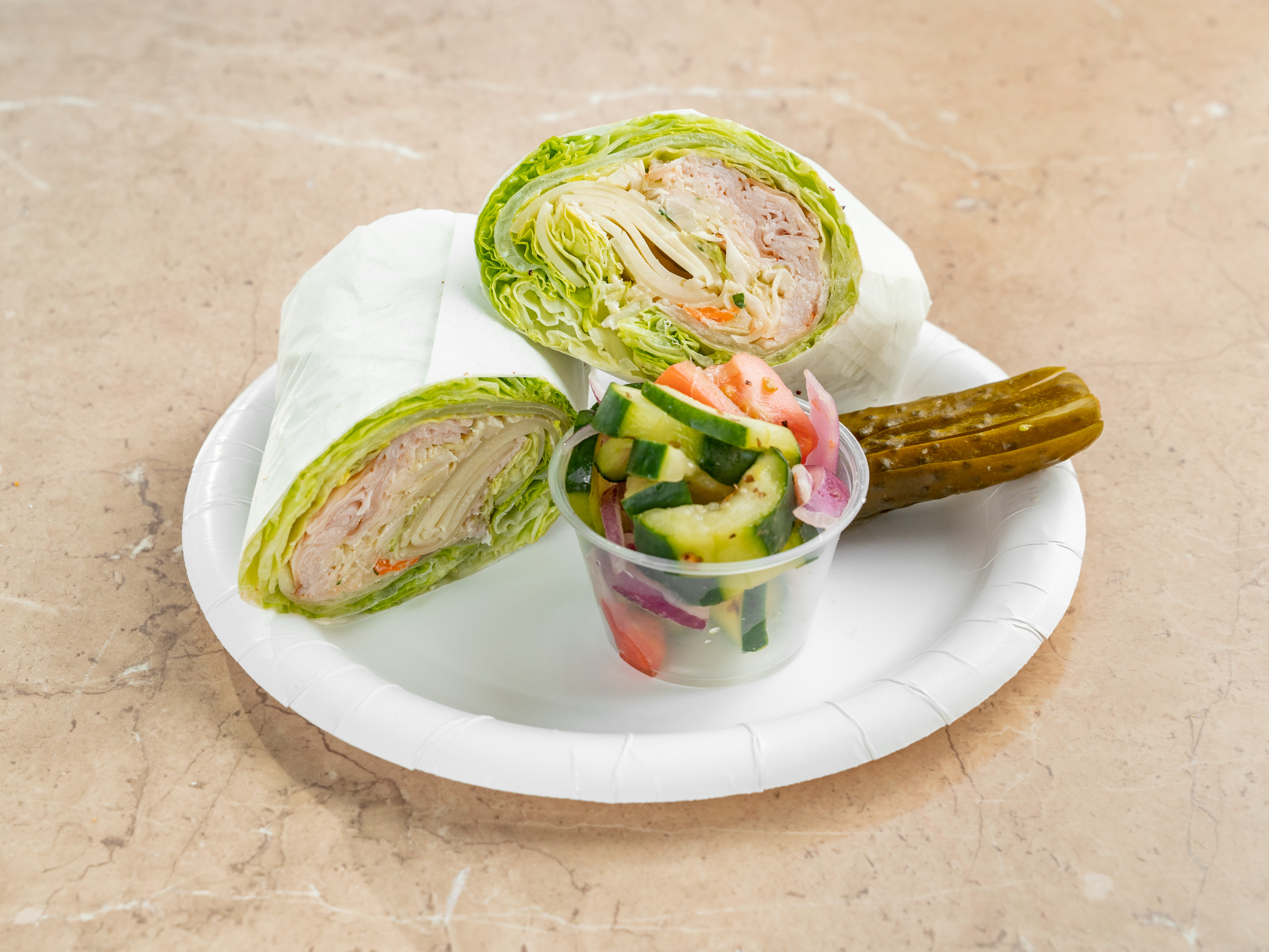 Order Lettuce Wrap Veggie Tuna, Chopped Tomato and Cucumber Wrap food online from Howard Beach Bagel Cafe store, Howard Beach on bringmethat.com