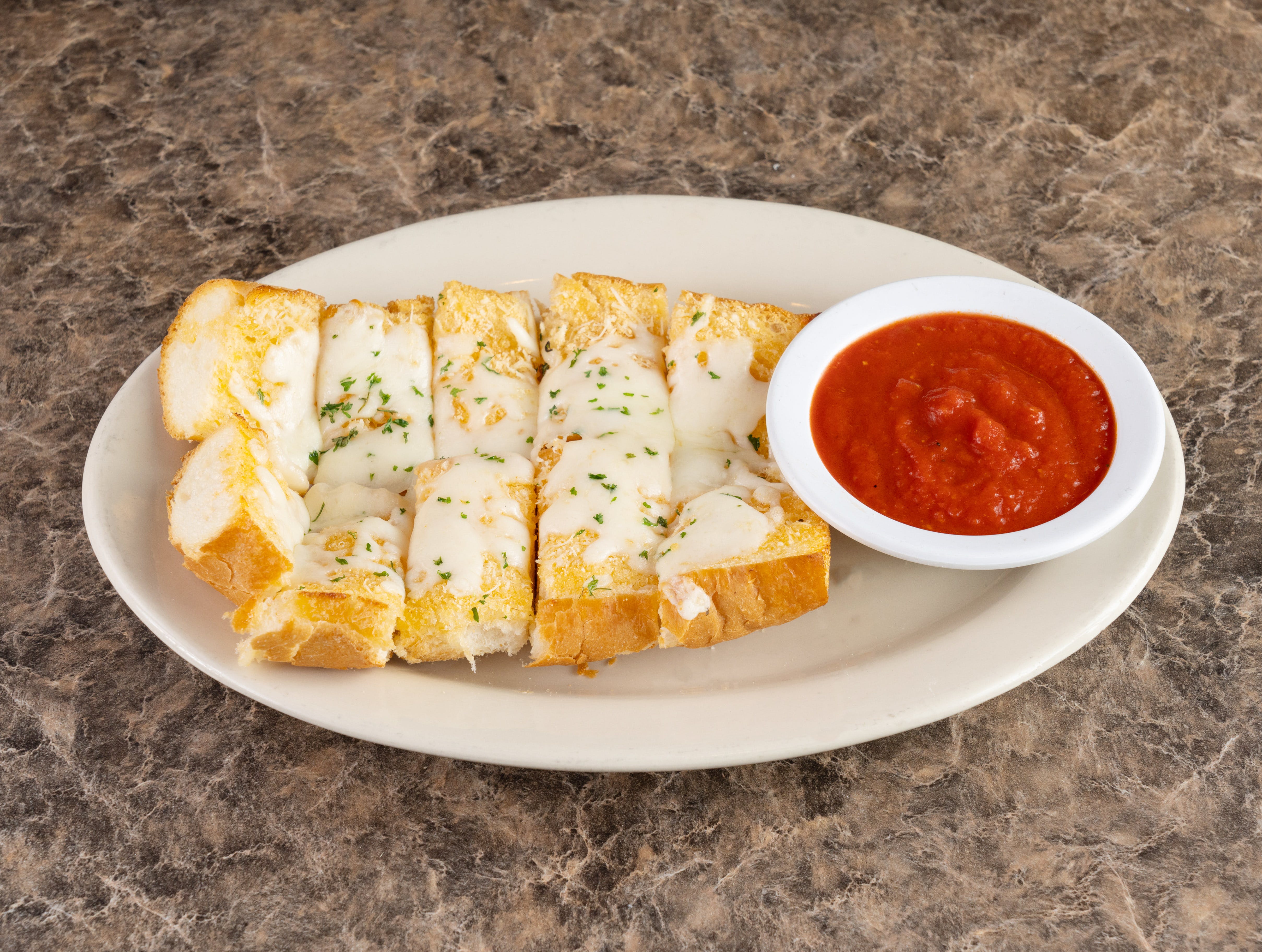 Order Garlic Bread with Mozzarella - Appetizer food online from Mario Pizza & Pasta store, Seabrook on bringmethat.com