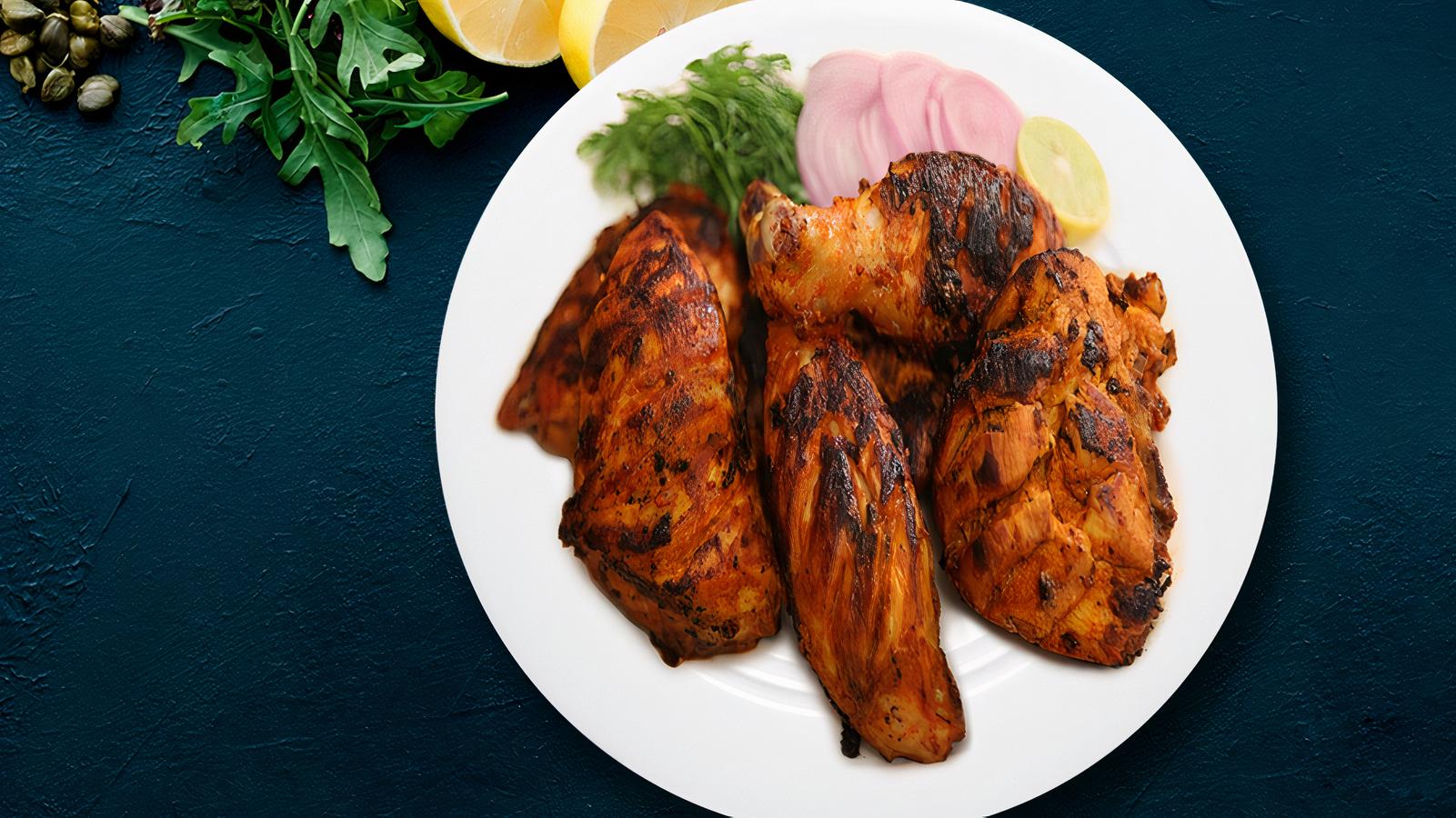 Order Charcoal Tandoori Chicken 2 Leg Pieces food online from Fire Biryani store, San Francisco on bringmethat.com